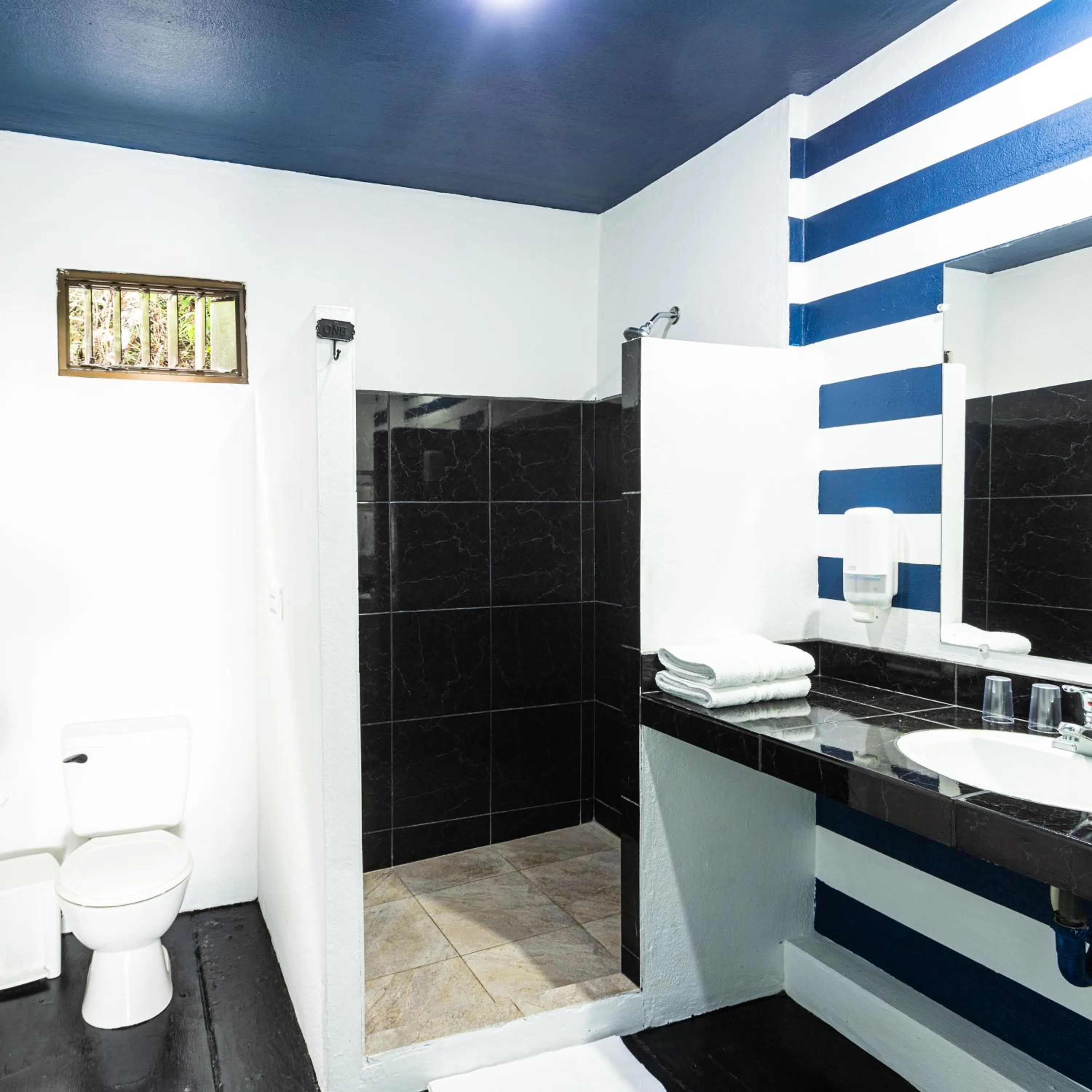 Shower in El Faro Containers Beach Hotel