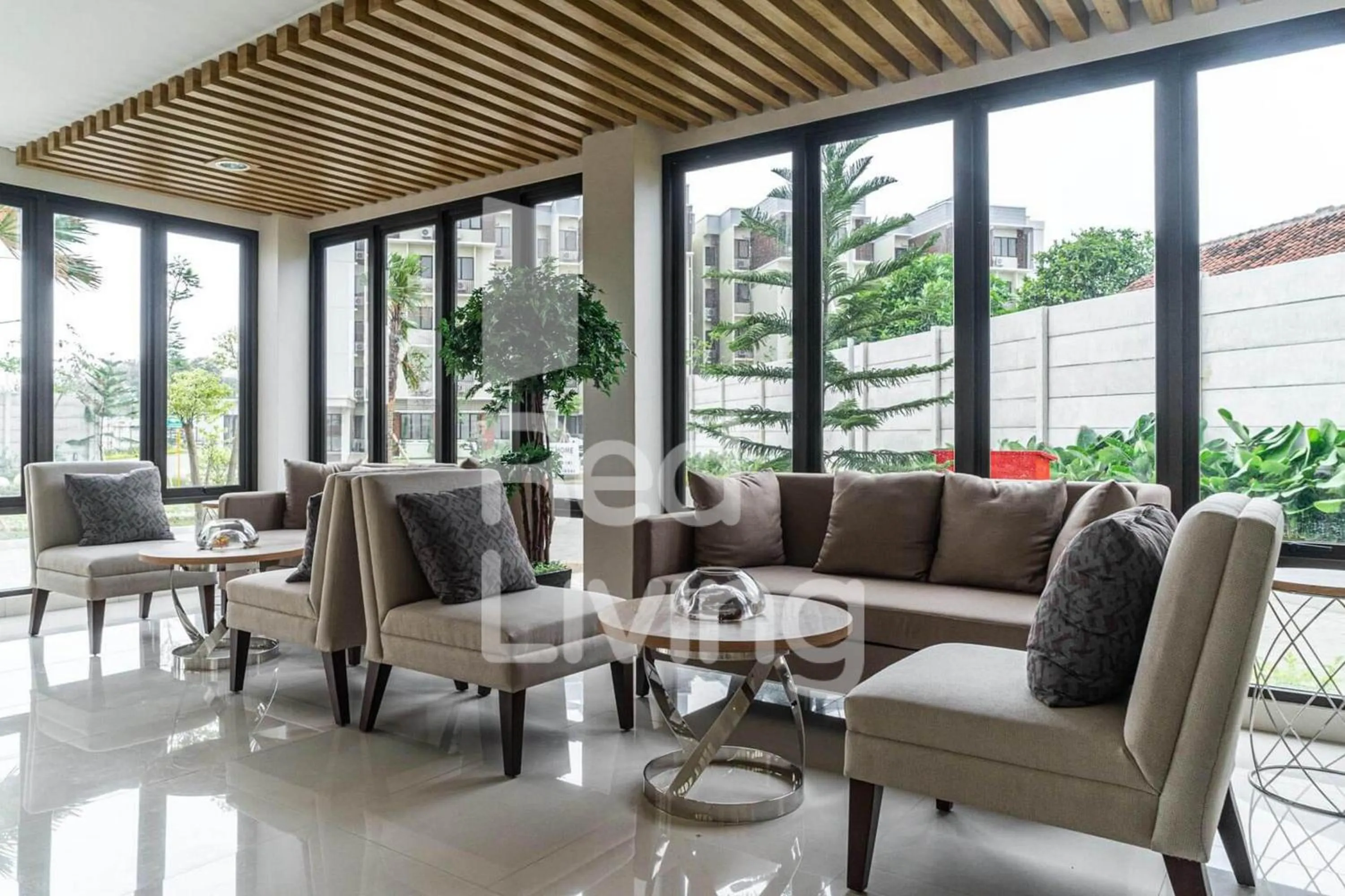 Living room in RedLiving Apartemen RQ at Ecohome Citra Raya