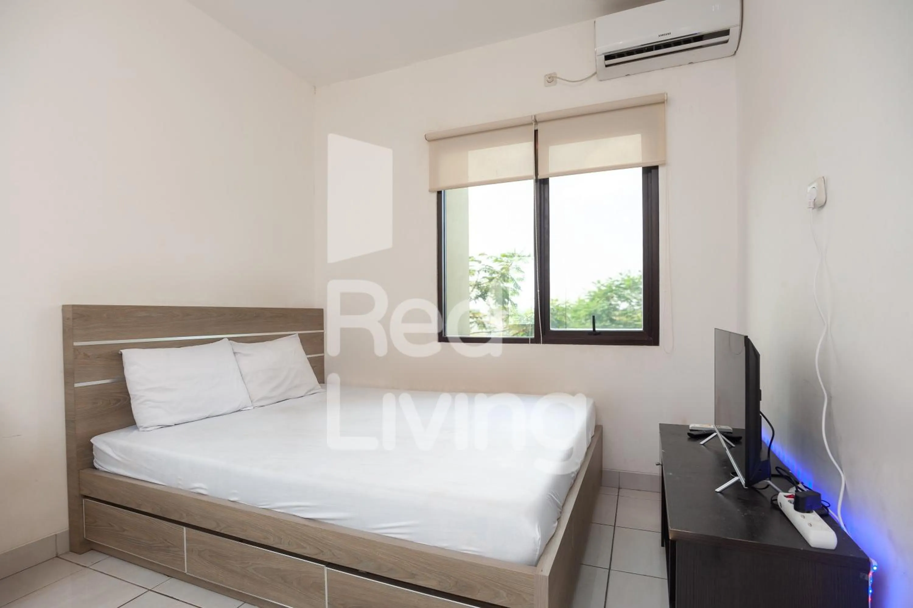 Bed in RedLiving Apartemen RQ at Ecohome Citra Raya