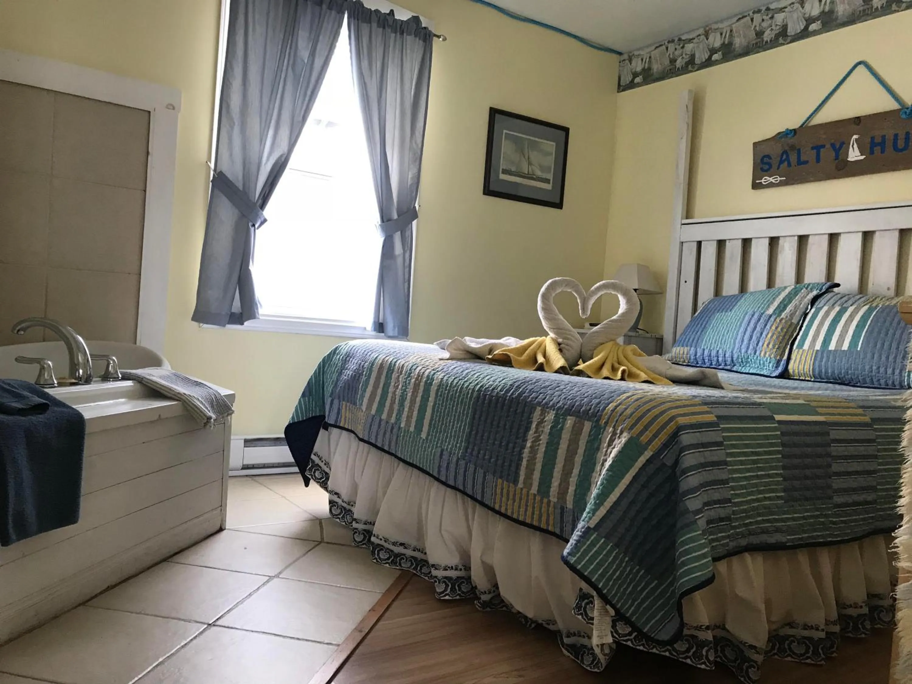 Bed in Whispering Waves Cottages