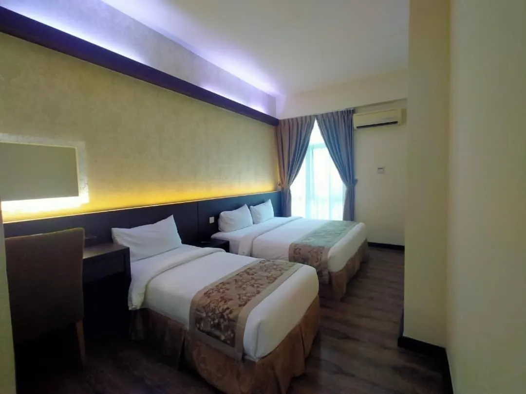 Bed in MidCity Hotel Melaka