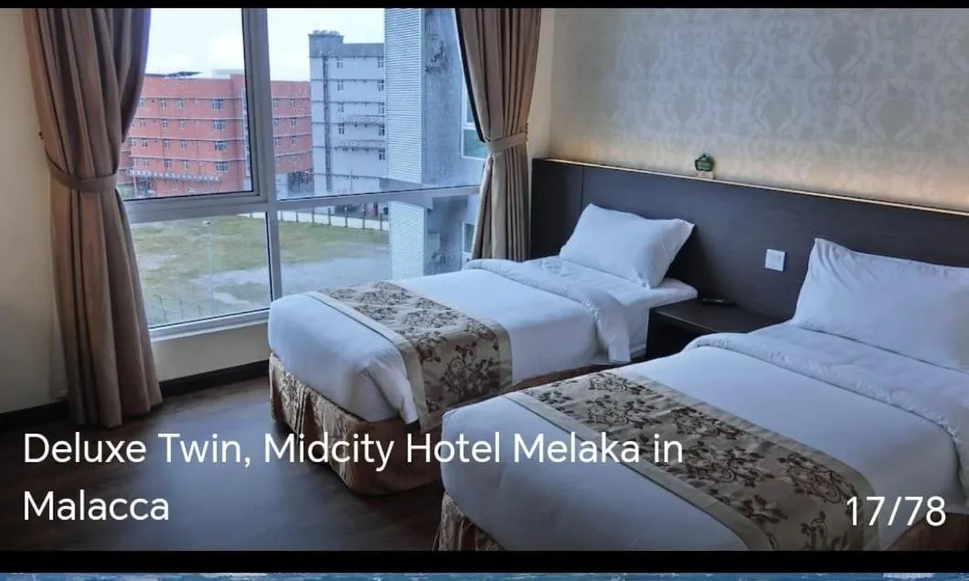 Bed in MidCity Hotel Melaka
