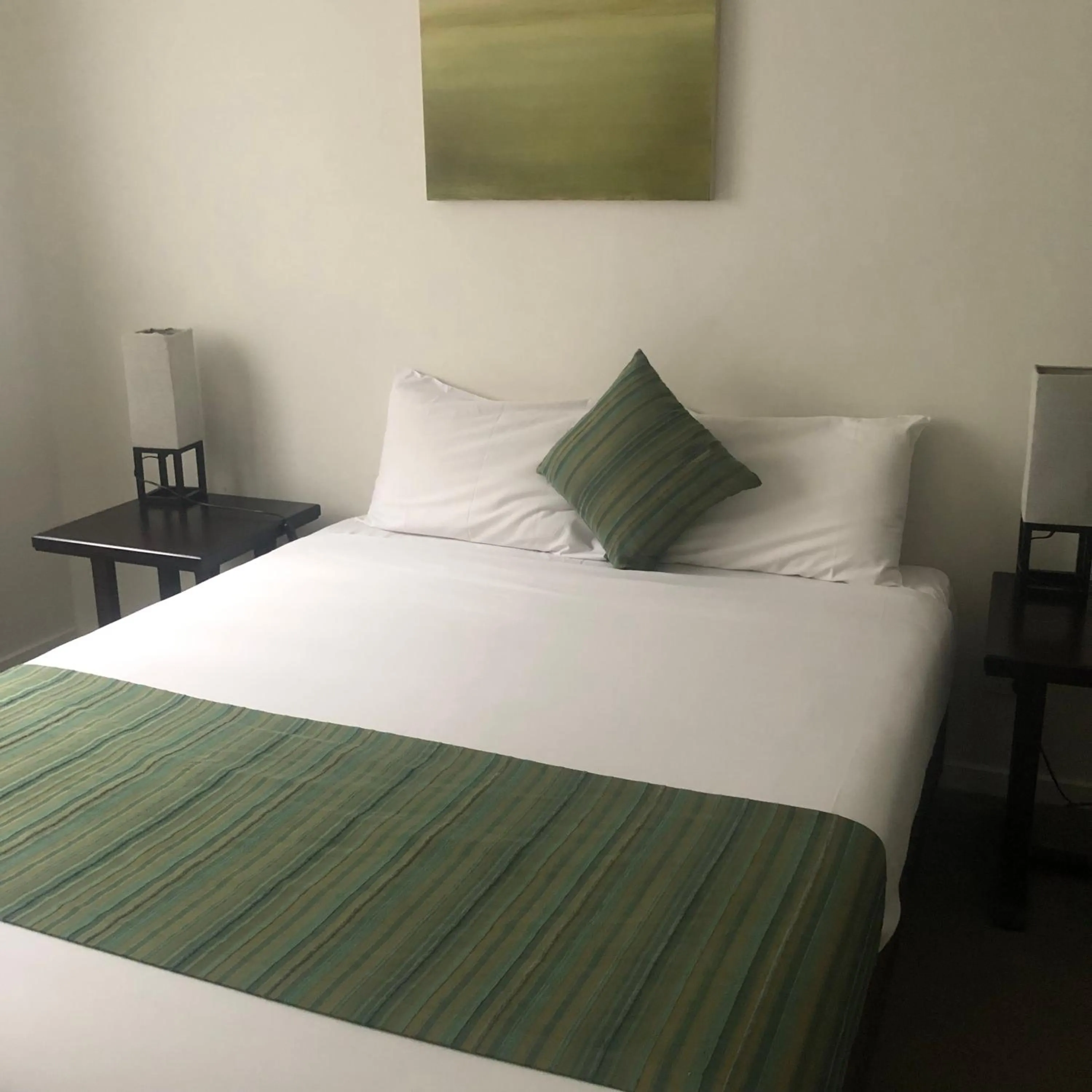 Bedroom, Bed in Curtis Central Apartments Official