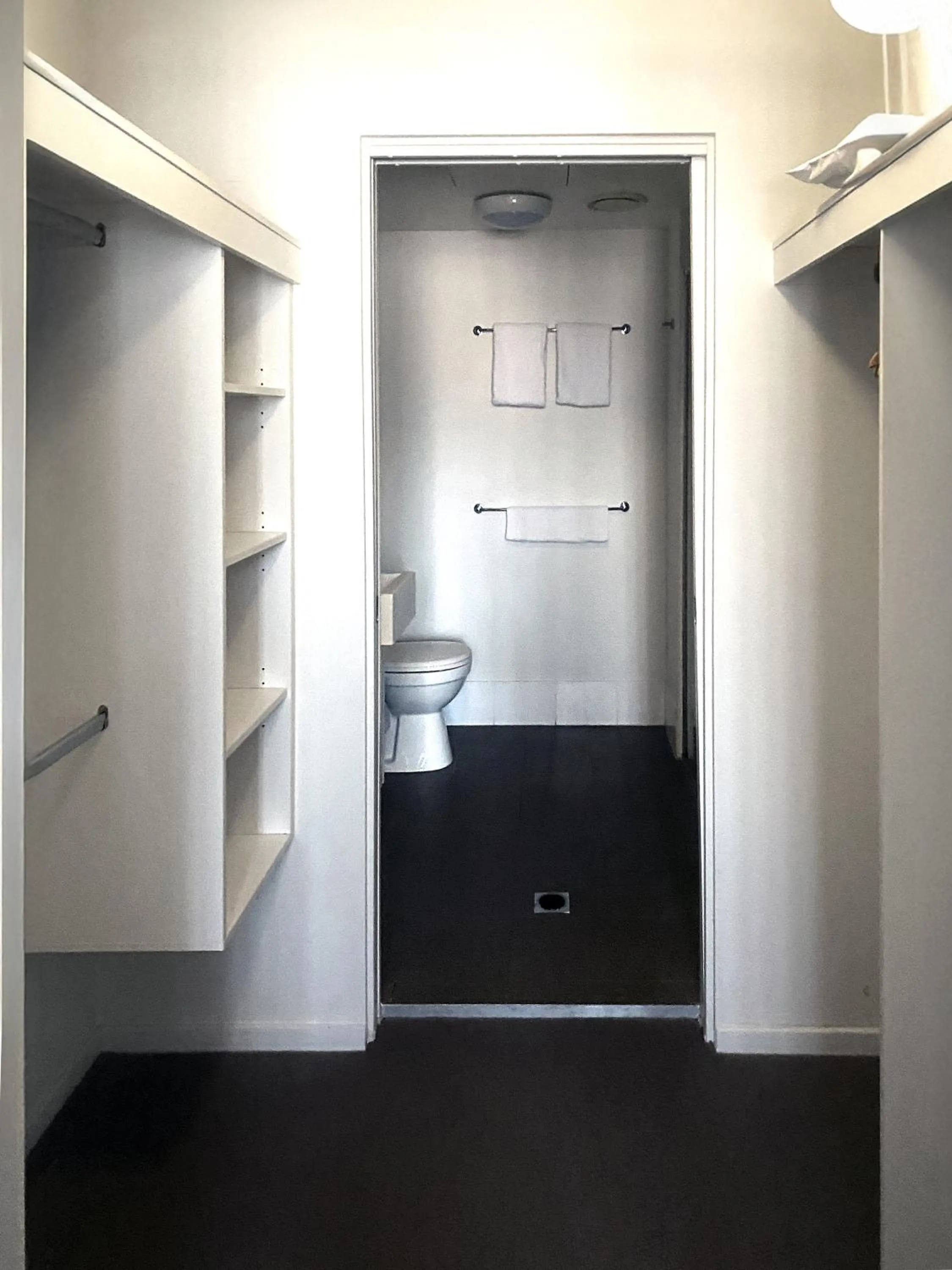 Toilet in Curtis Central Apartments Official