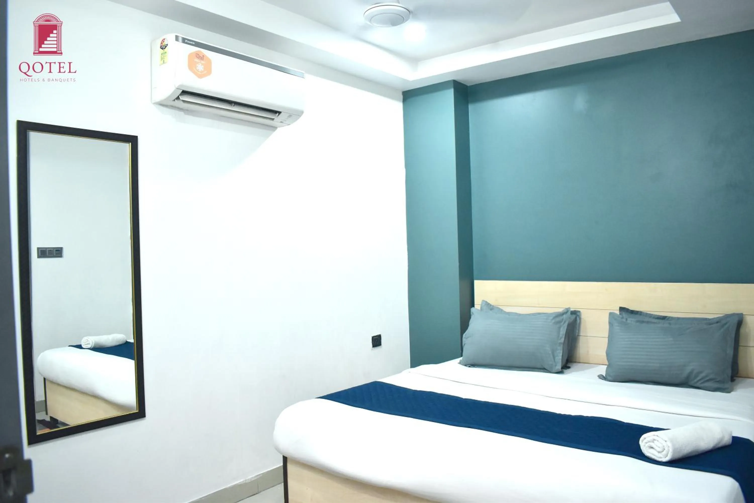 Bed in Qotel Hotel Rama Rohini Sector-24 Couple Friendly
