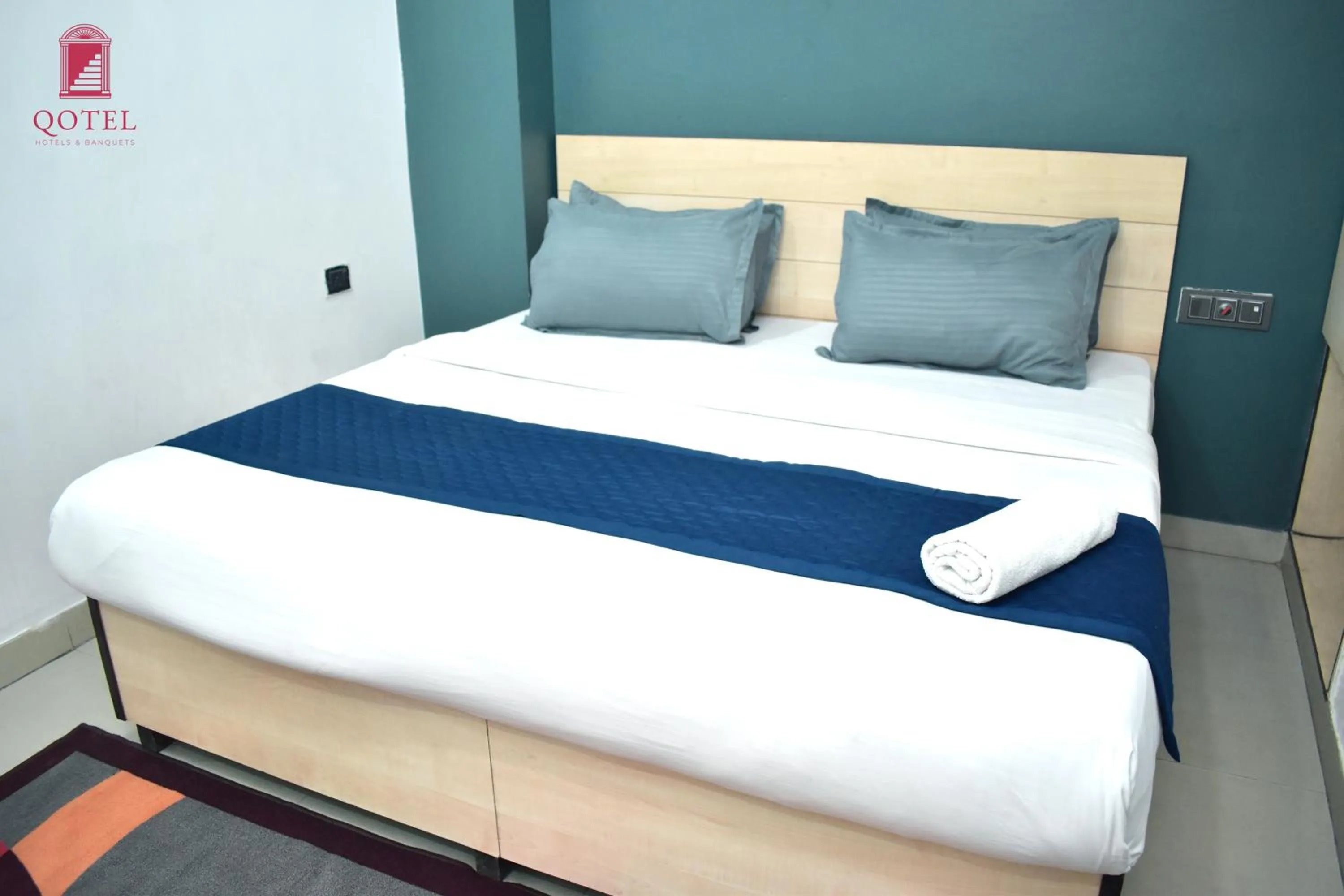 Bed in Qotel Hotel Rama Rohini Sector-24 Couple Friendly