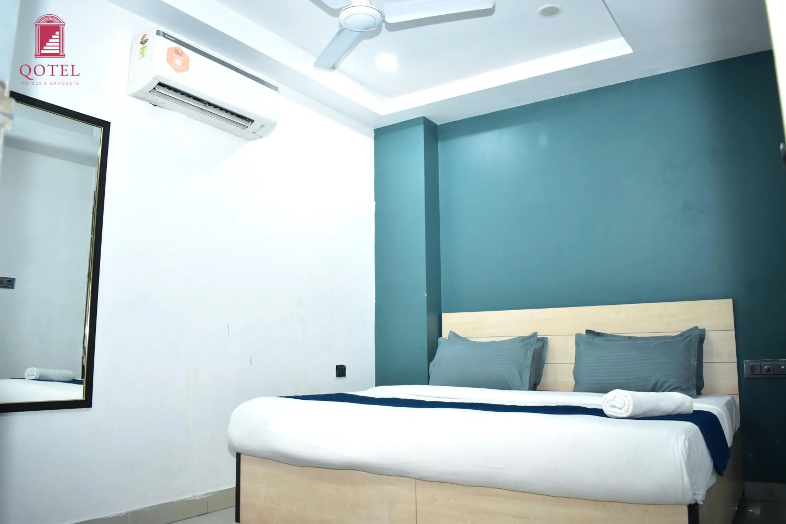 Bed in Qotel Hotel Rama Rohini Sector-24 Couple Friendly