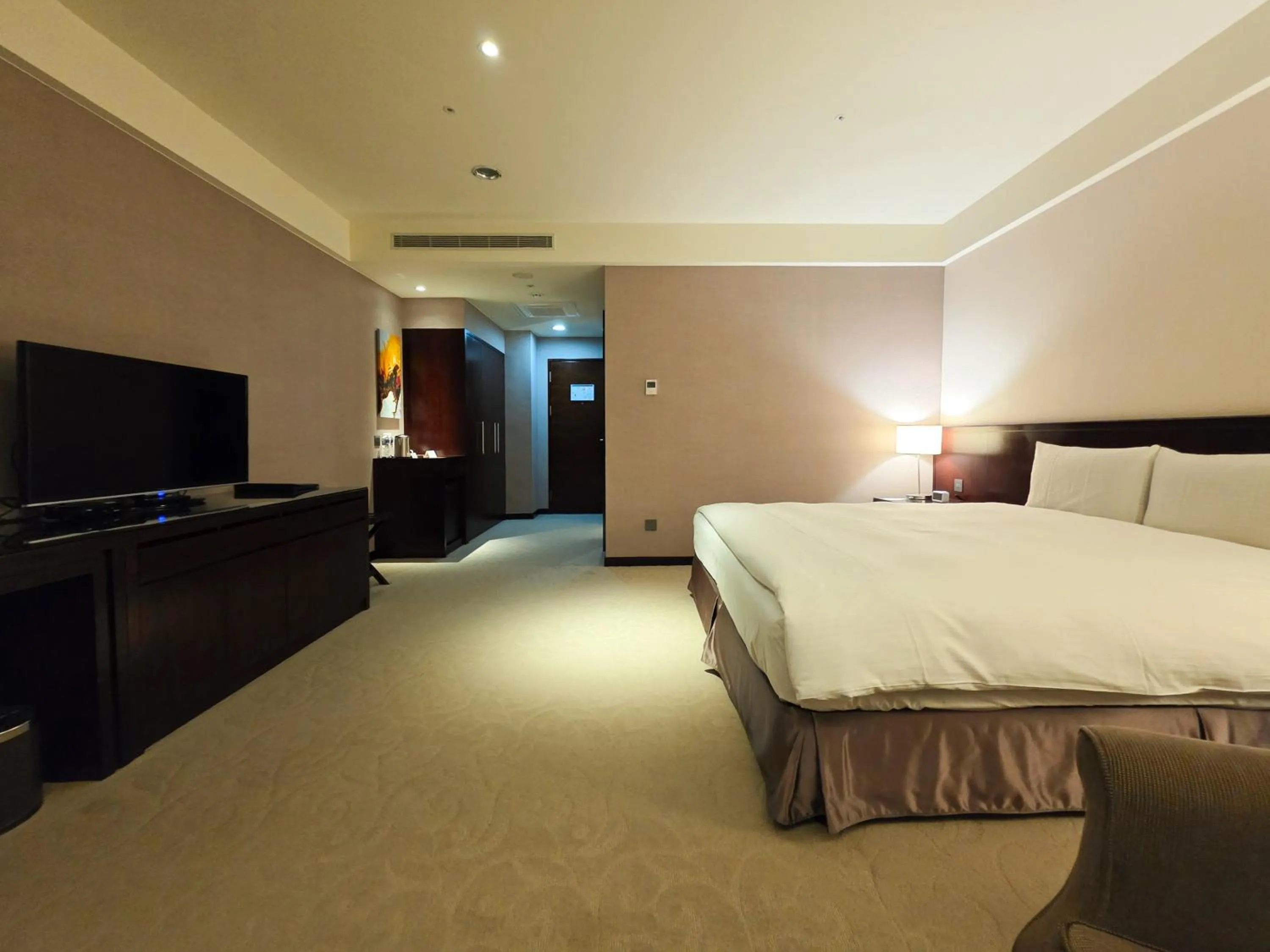 Bed in 雀客旅館台中來來