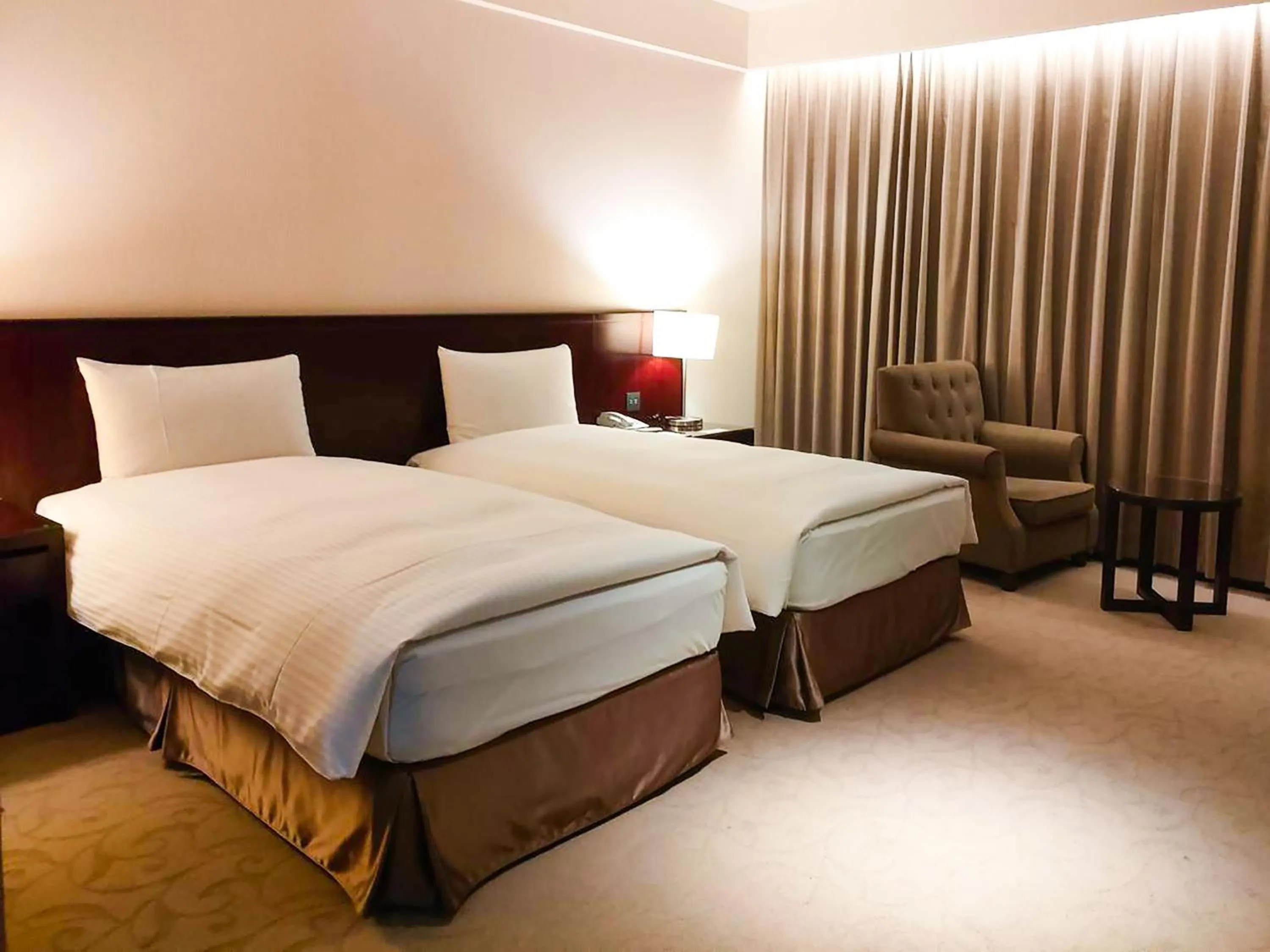 Bed in 雀客旅館台中來來