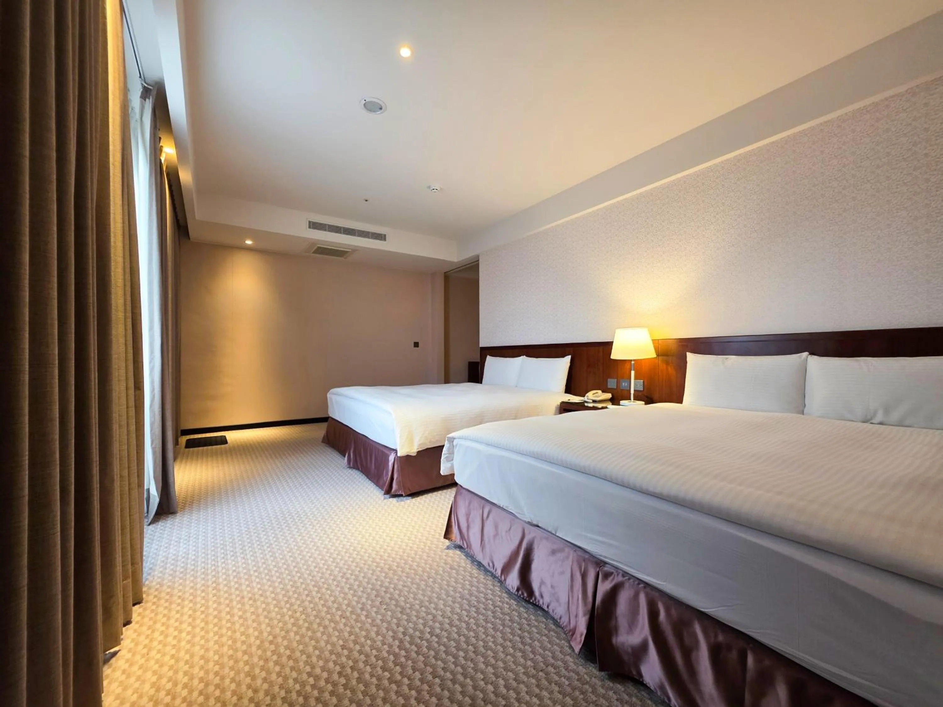 Bed in 雀客旅館台中來來