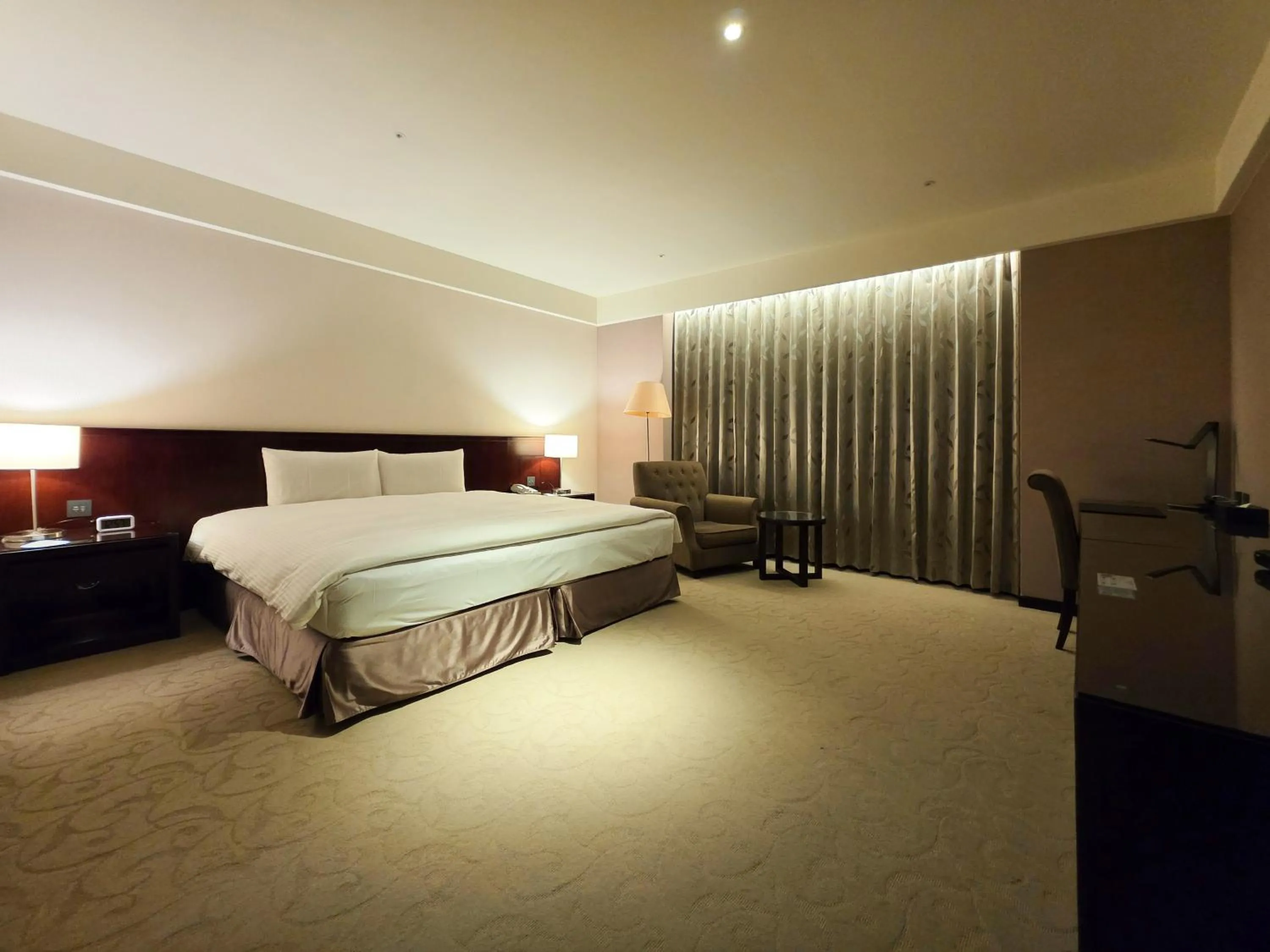 Bed in 雀客旅館台中來來