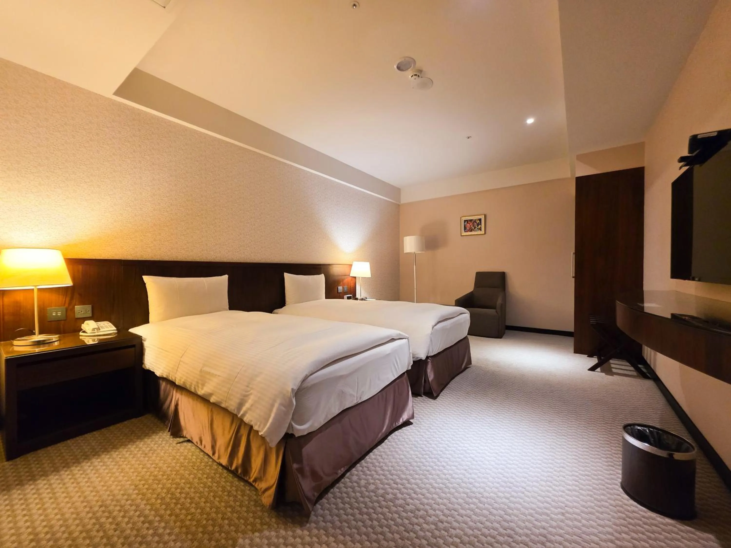 Bed in 雀客旅館台中來來