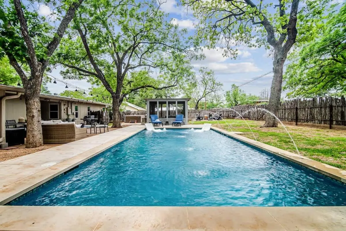 Swimming pool in Backyard Oasis w/Pool, Hot-Tub, Grill & Fire Pit!