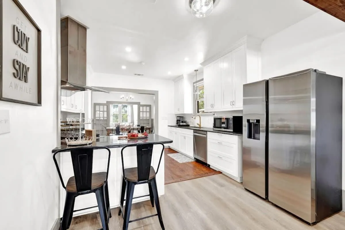 Kitchen or kitchenette in Brand New Private Pool and Hot-Tub Near Main!