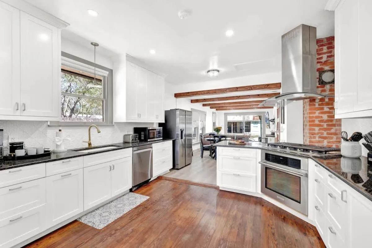 Kitchen or kitchenette in Brand New Private Pool and Hot-Tub Near Main!