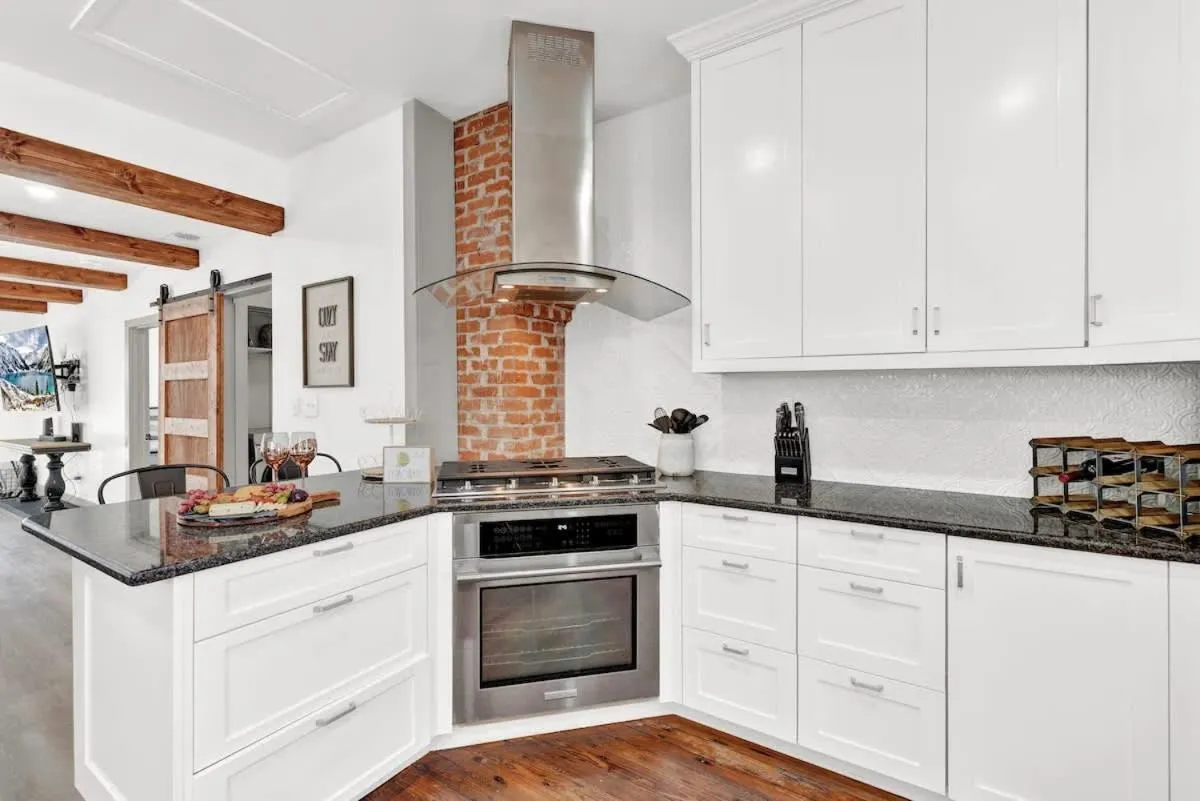 Kitchen or kitchenette in Brand New Private Pool and Hot-Tub Near Main!