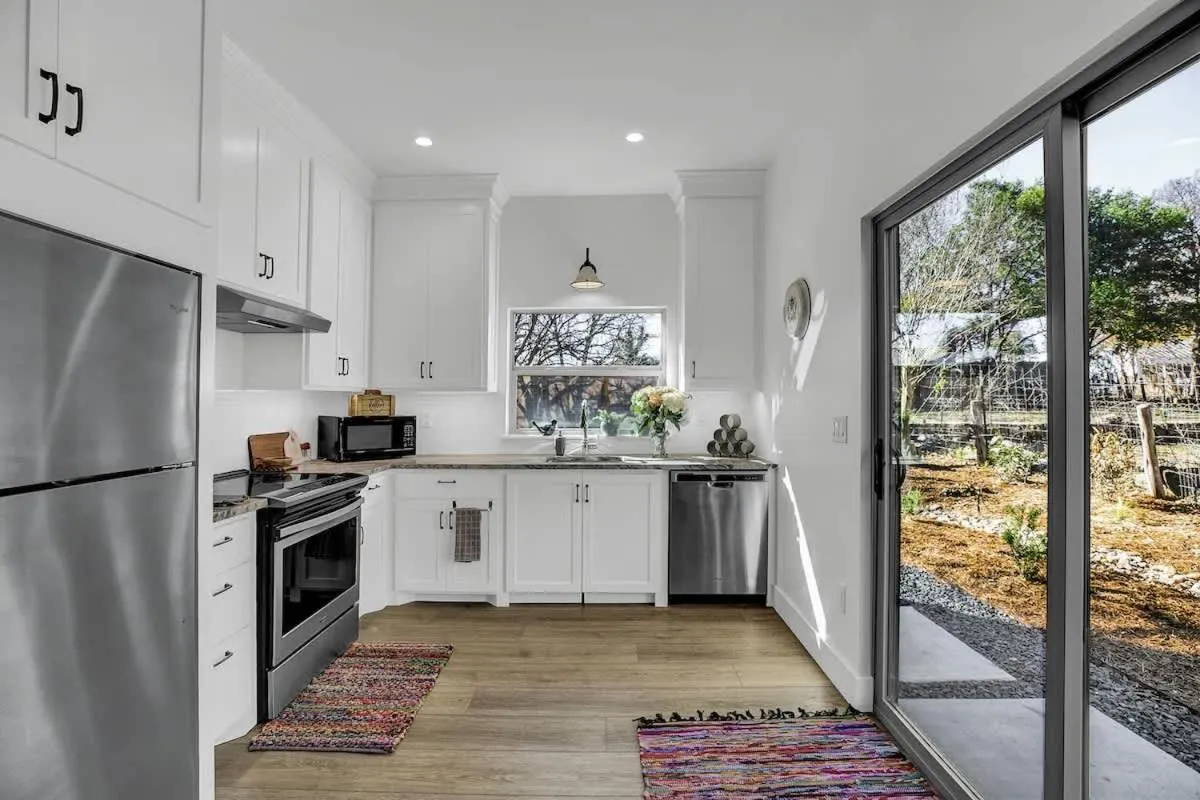 Kitchen or kitchenette in New! Luxurious Home with Wine Cellar & Firepit!