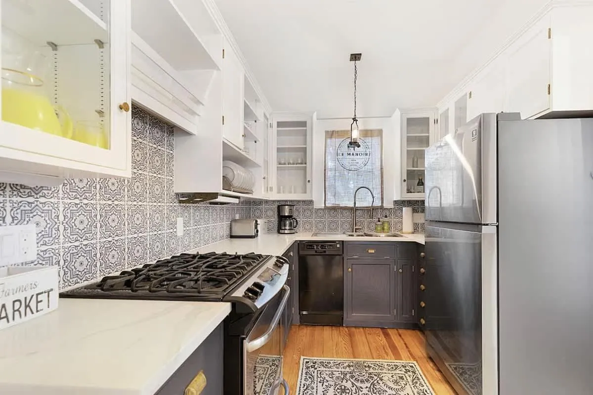 Kitchen or kitchenette in Stunning Home with Hot Tub & Grill Just 2 Blks from Main St!