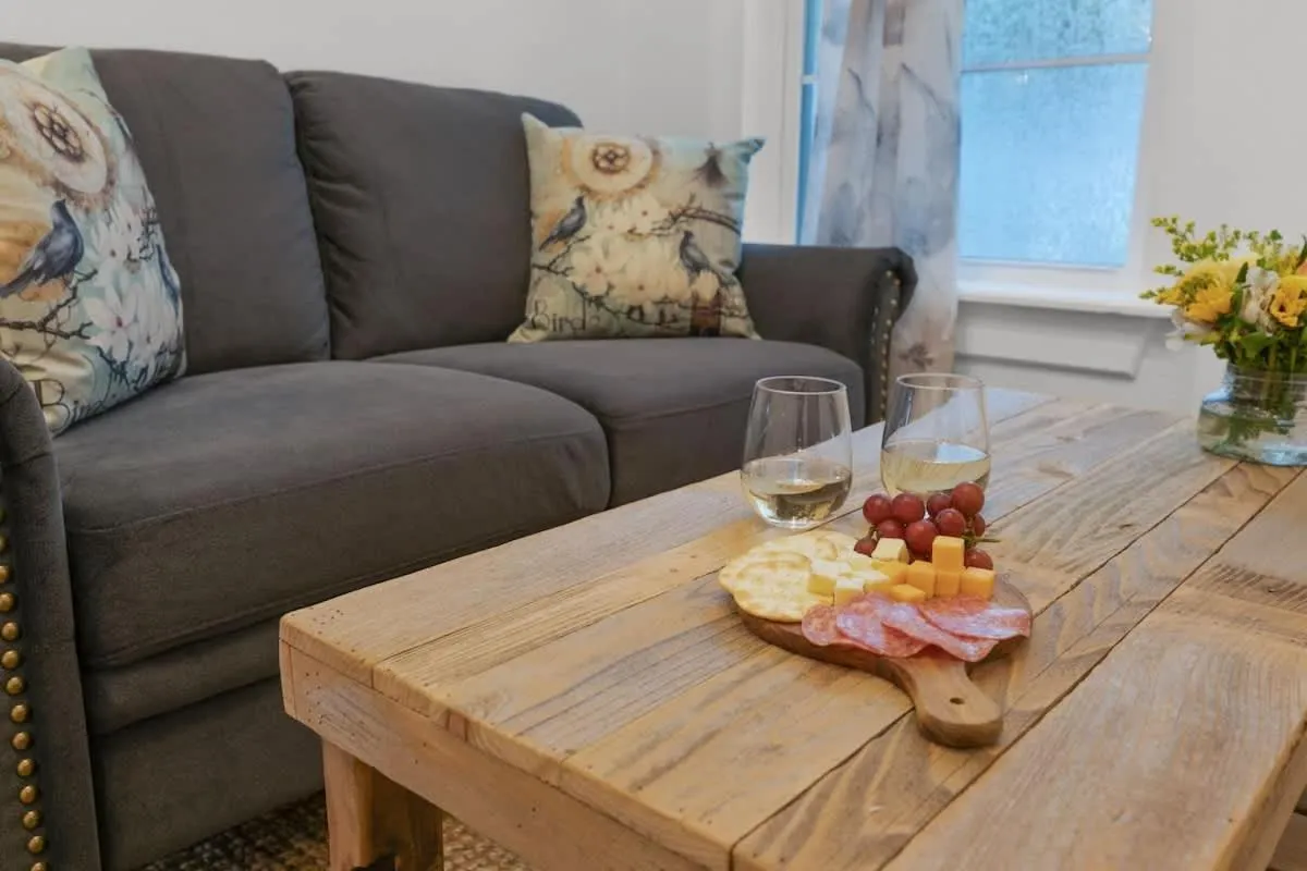 Living room in Stunning Home with Hot Tub & Grill Just 2 Blks from Main St!