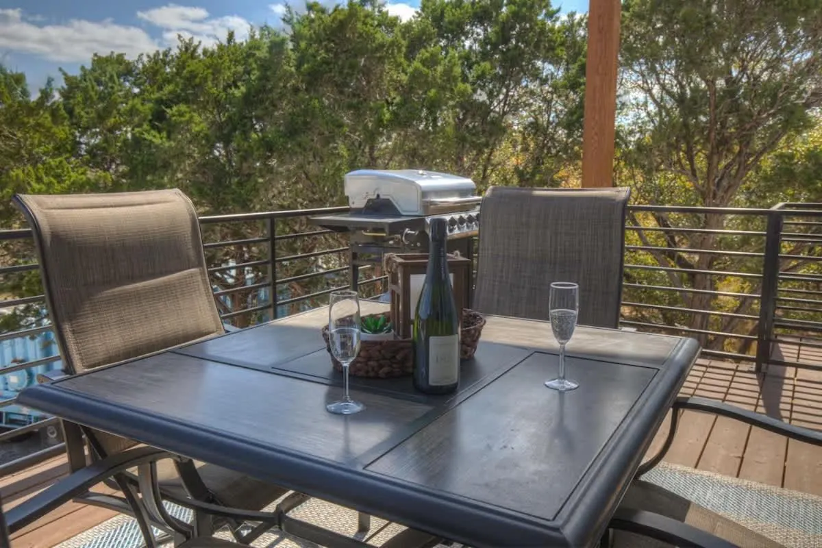 Patio in Stunning Lake Home with Pool-Beach-Gym-Boat Access