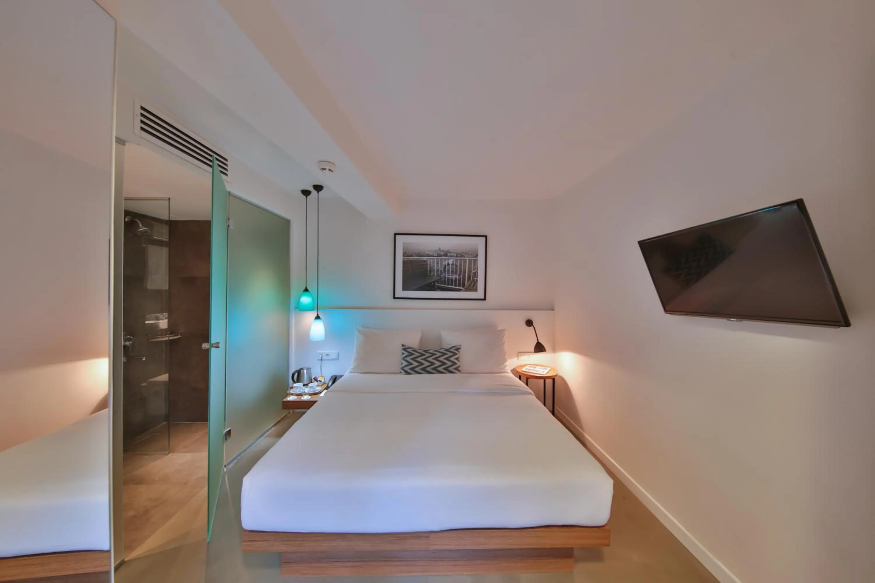 Bed in Alilass Hotel