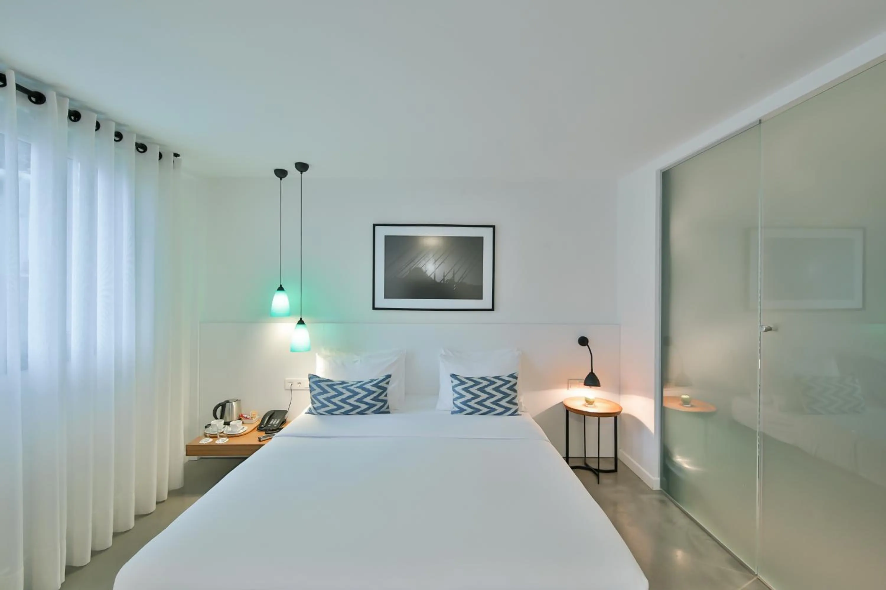 Bed in Alilass Hotel