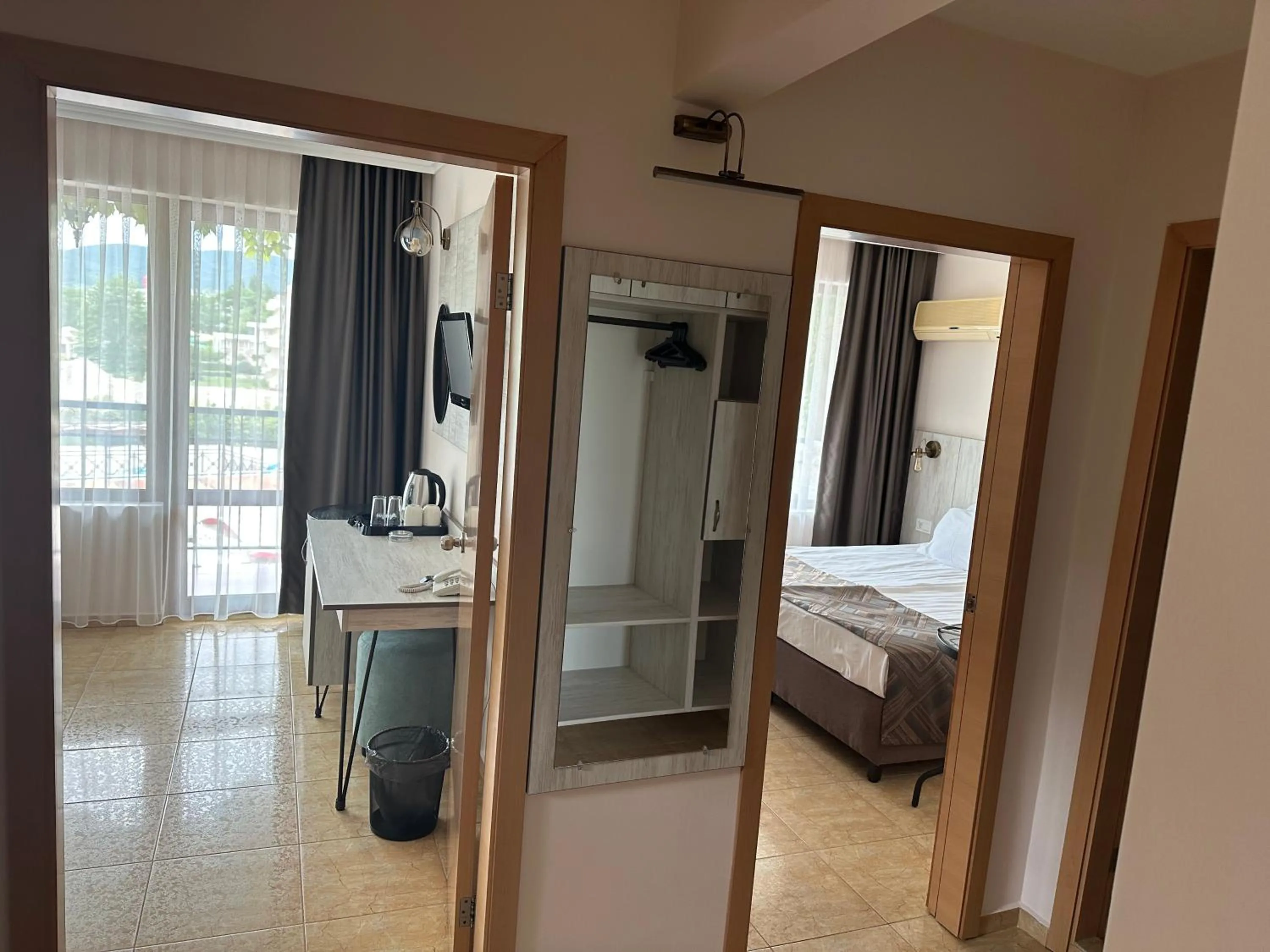 Photo of the whole room, Bed in Oleander House and Tennis Club