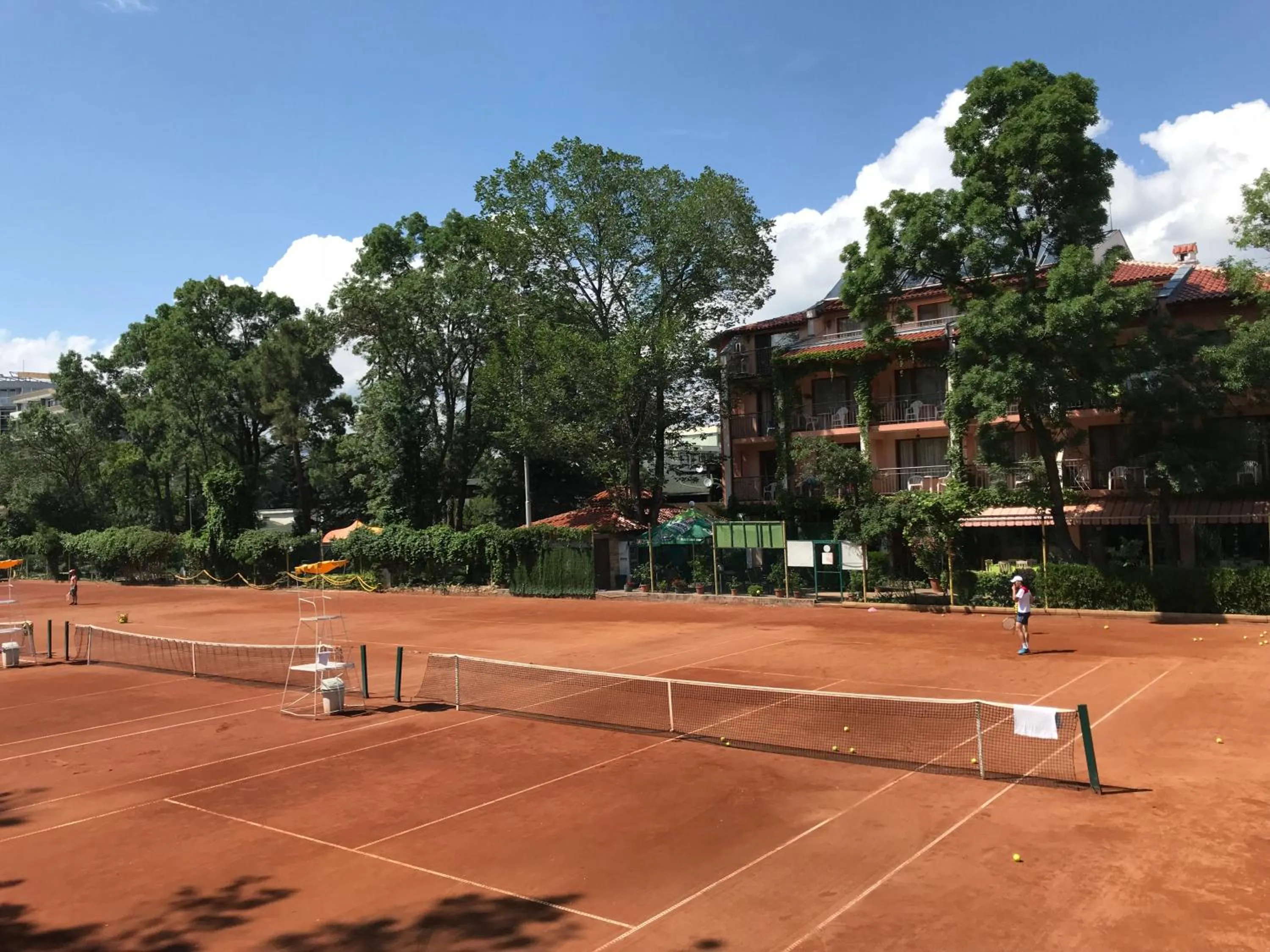 Tennis court in Oleander House and Tennis Club