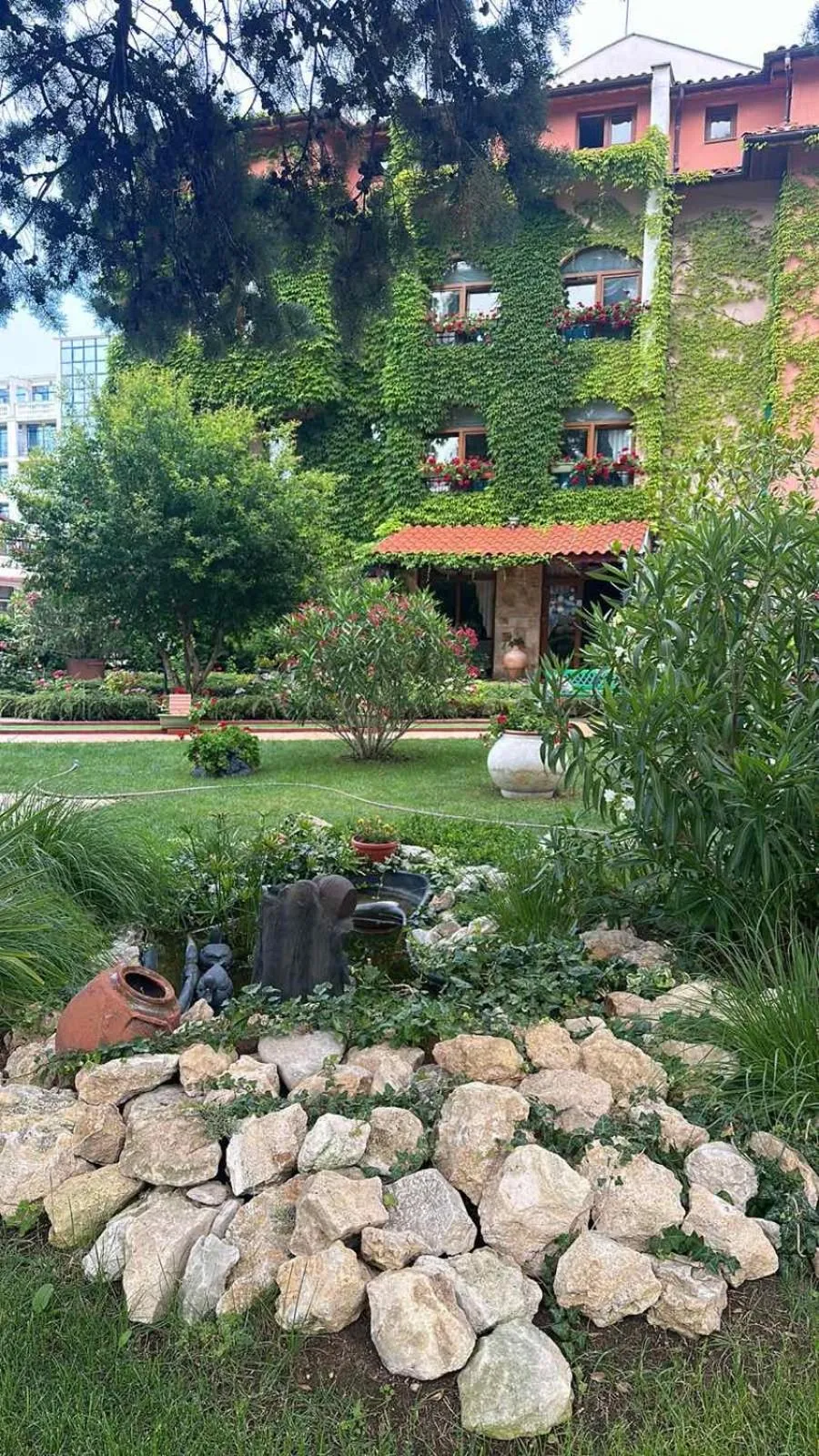 Garden in Oleander House and Tennis Club