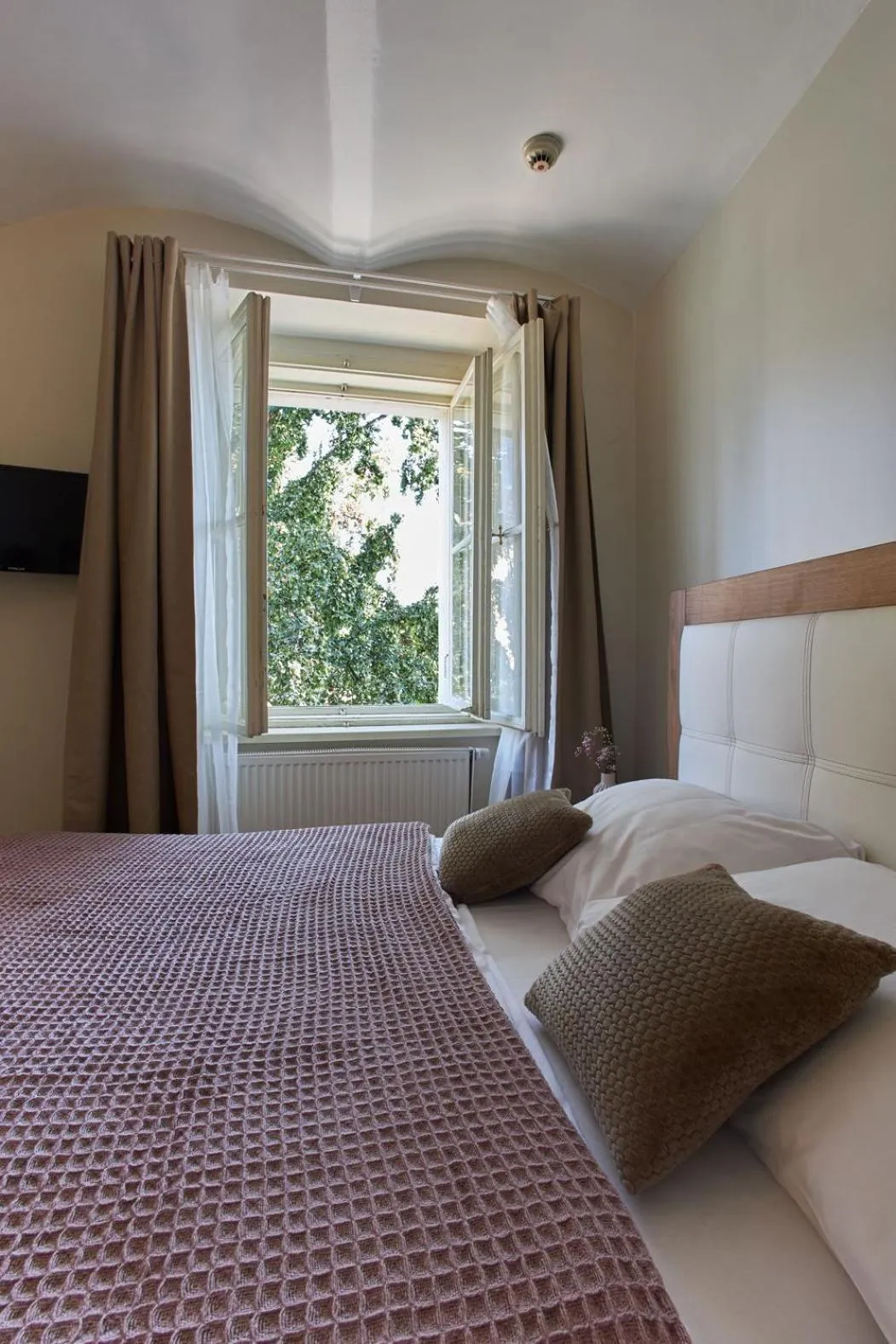 Bed in River View Residence by Charles Bridge