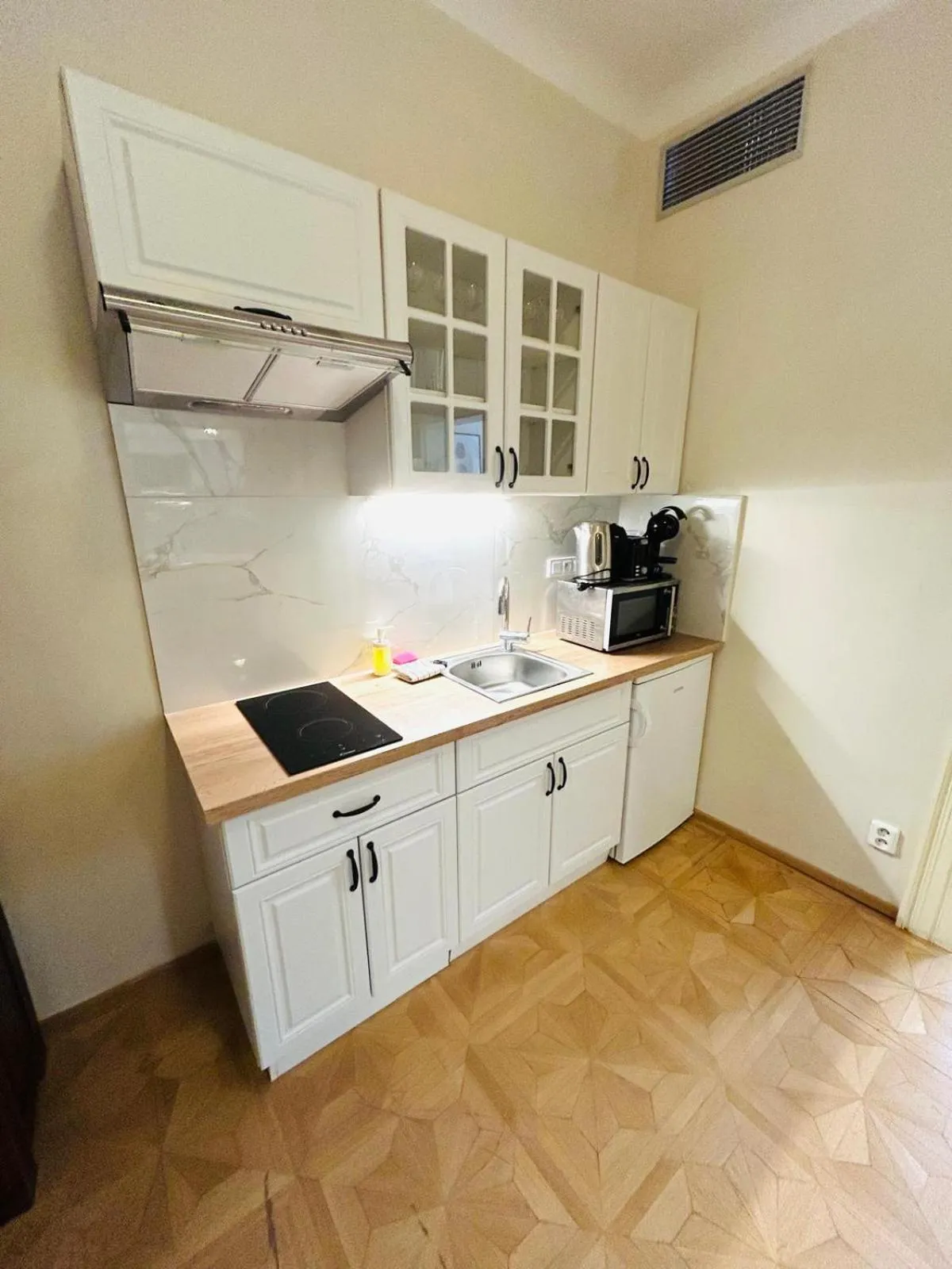 Kitchen or kitchenette in River View Residence by Charles Bridge