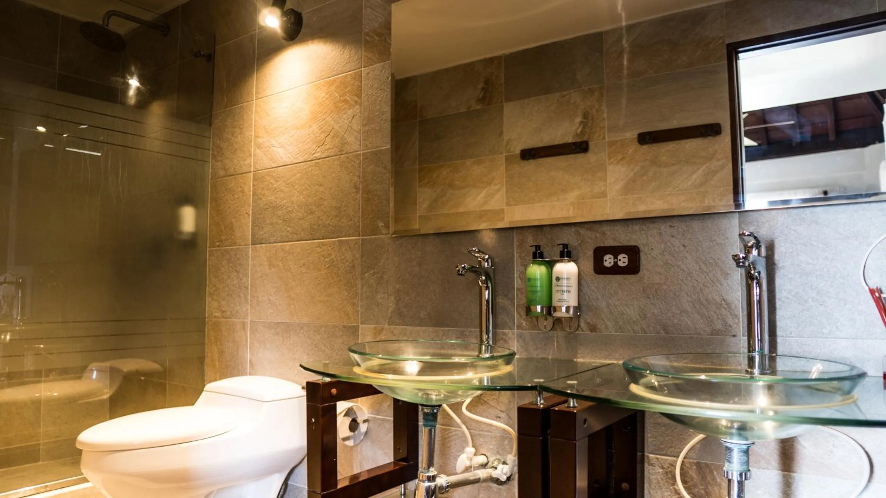 Bathroom in Hotel Rosario de Mar by Tequendama