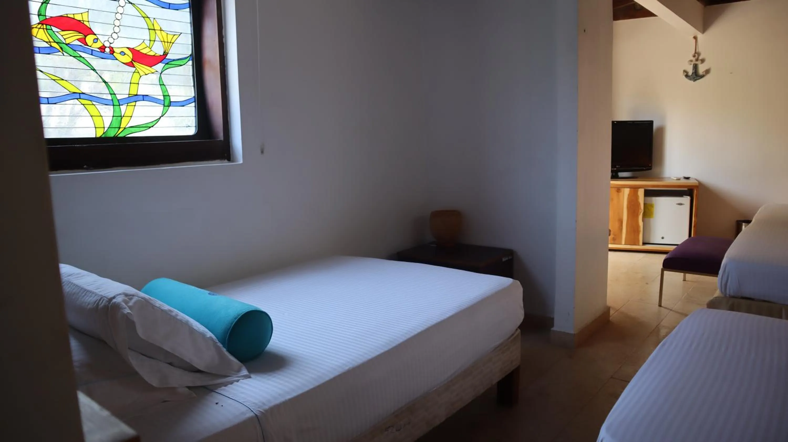 Bed in Hotel Rosario de Mar by Tequendama