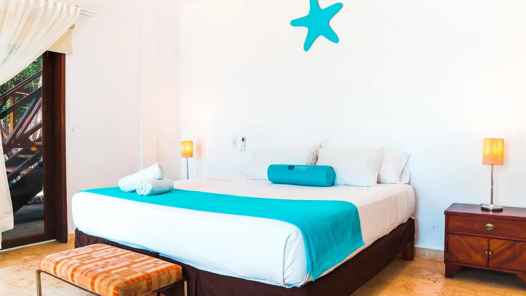 Bed in Hotel Rosario de Mar by Tequendama