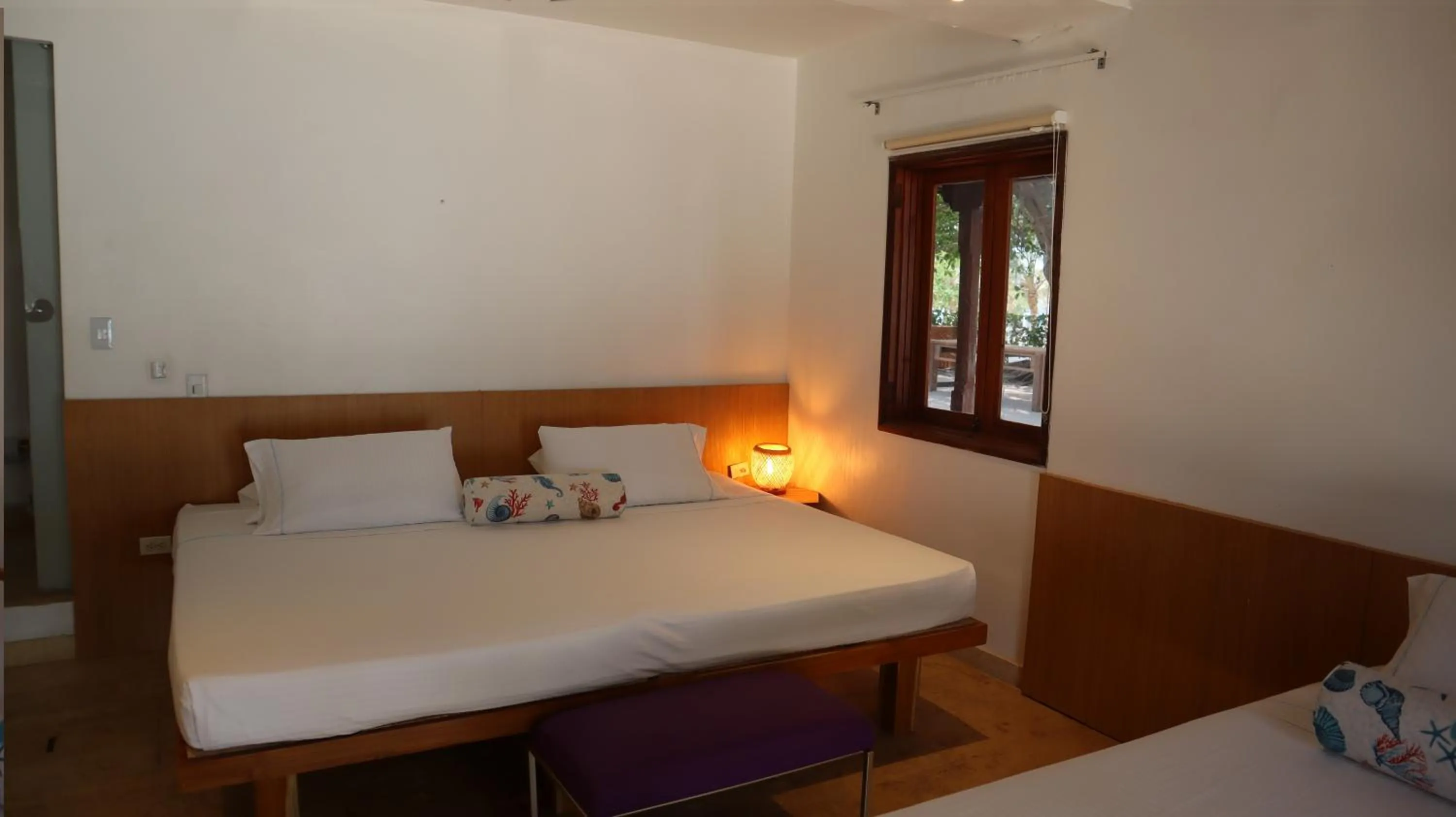 Bed in Hotel Rosario de Mar by Tequendama