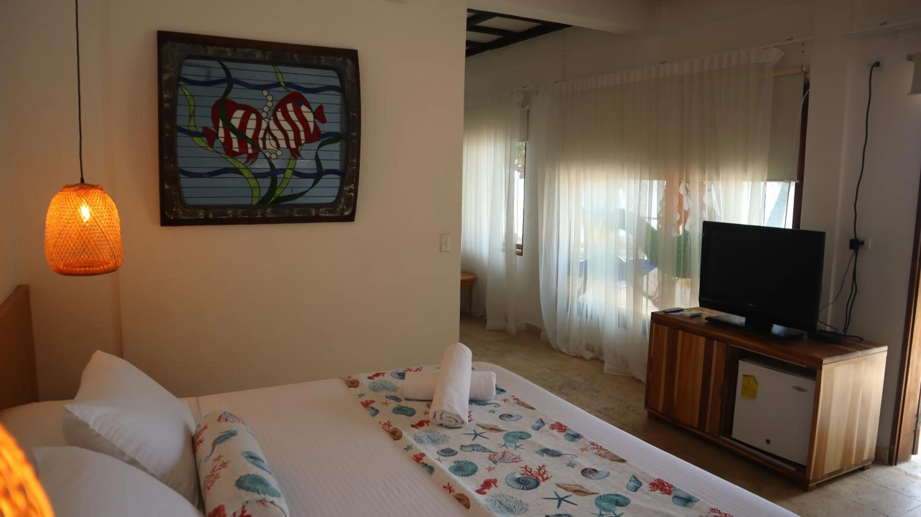 Bed in Hotel Rosario de Mar by Tequendama