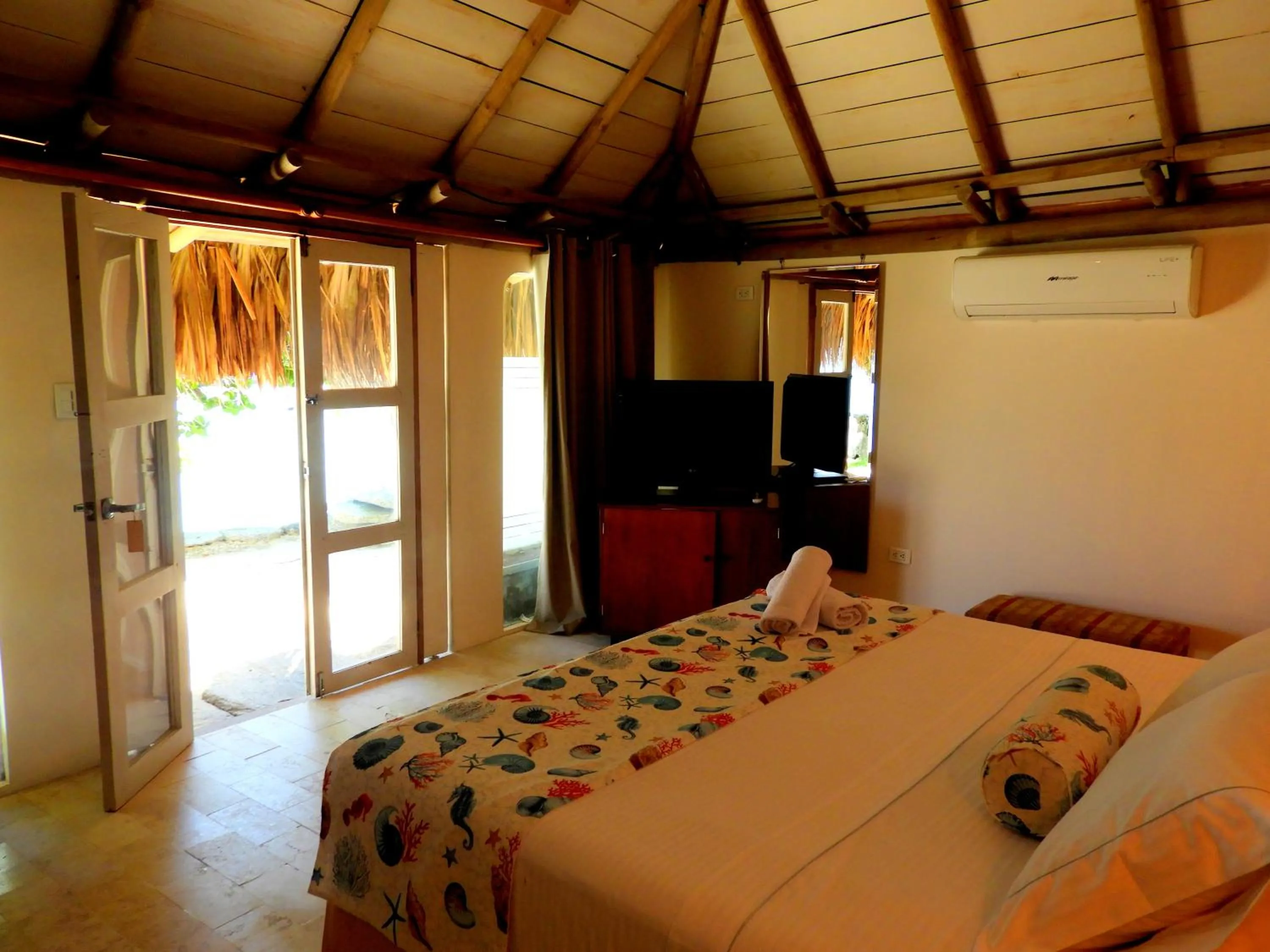 Photo of the whole room, Bed in Hotel Rosario de Mar by Tequendama