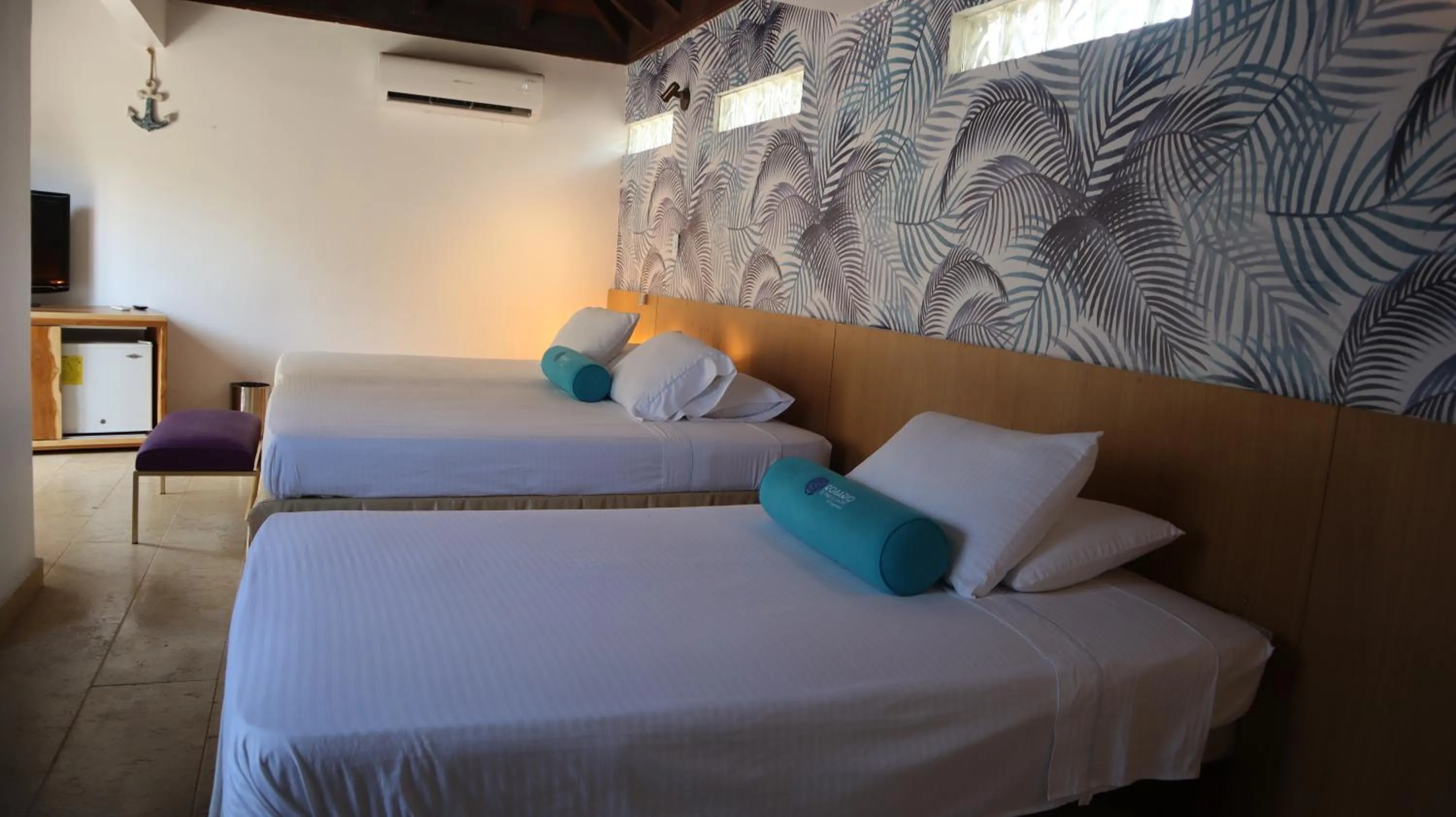 Bed in Hotel Rosario de Mar by Tequendama