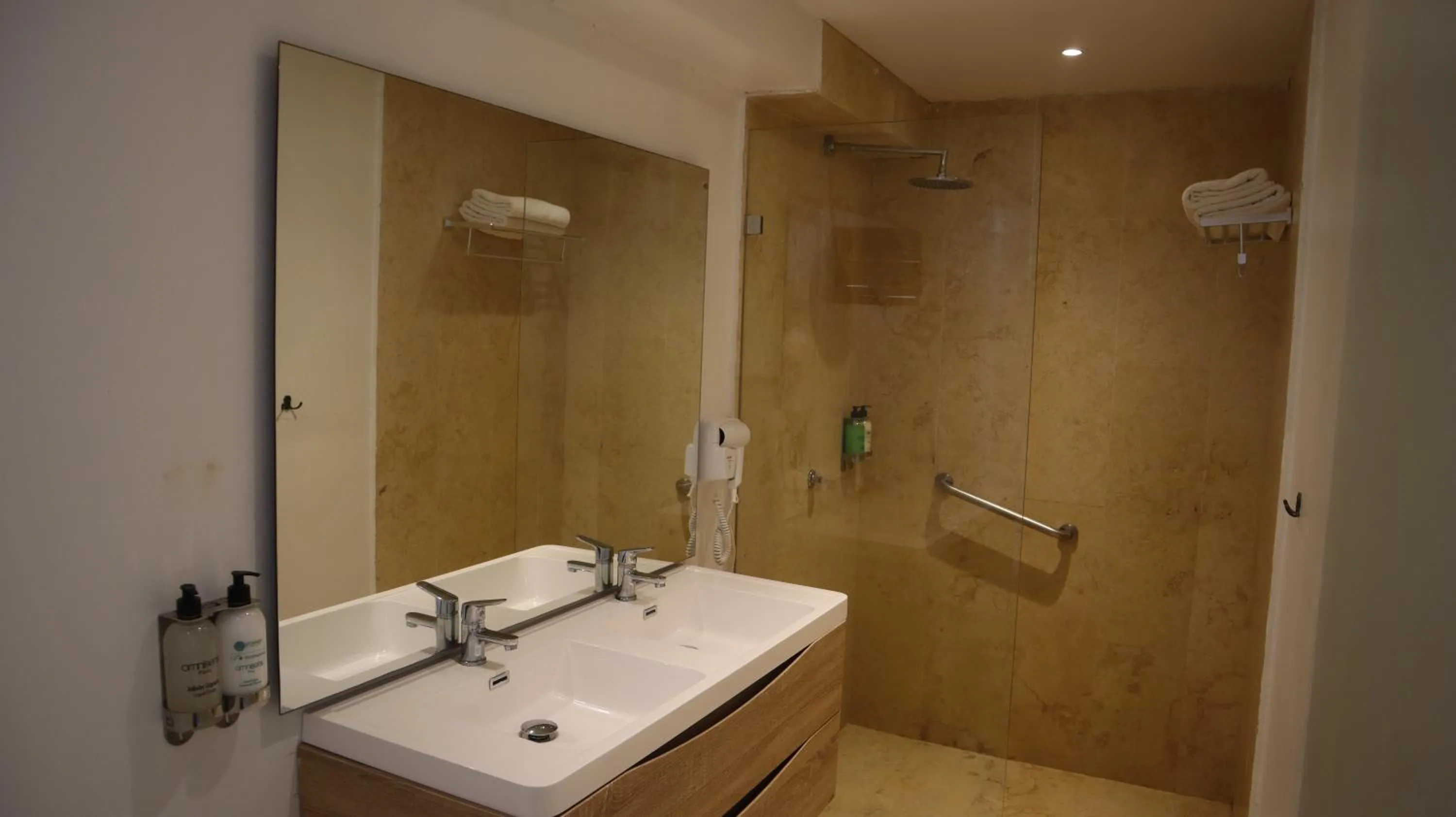 Shower in Hotel Rosario de Mar by Tequendama