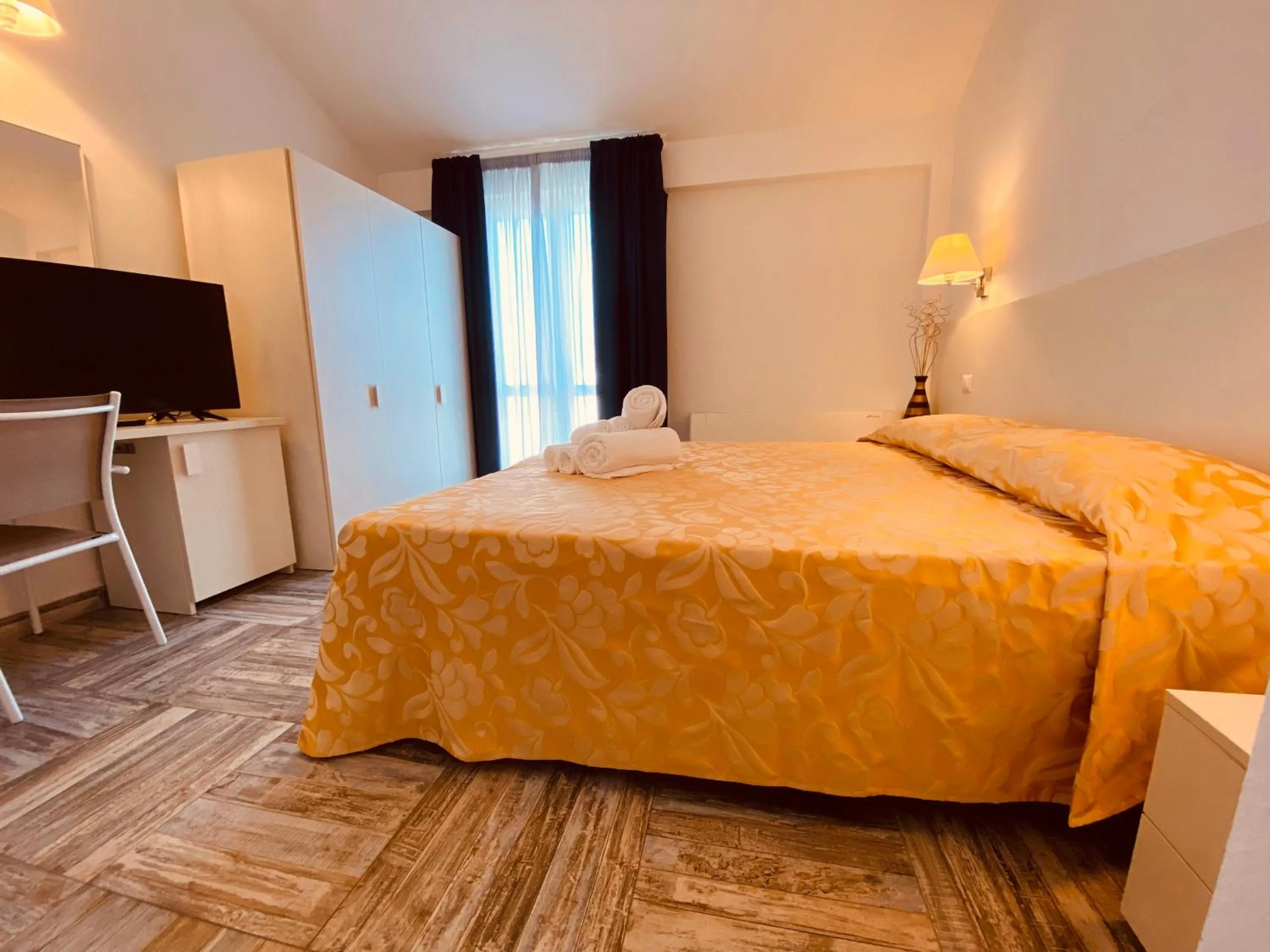 Bed in Hotel Muita di Mari