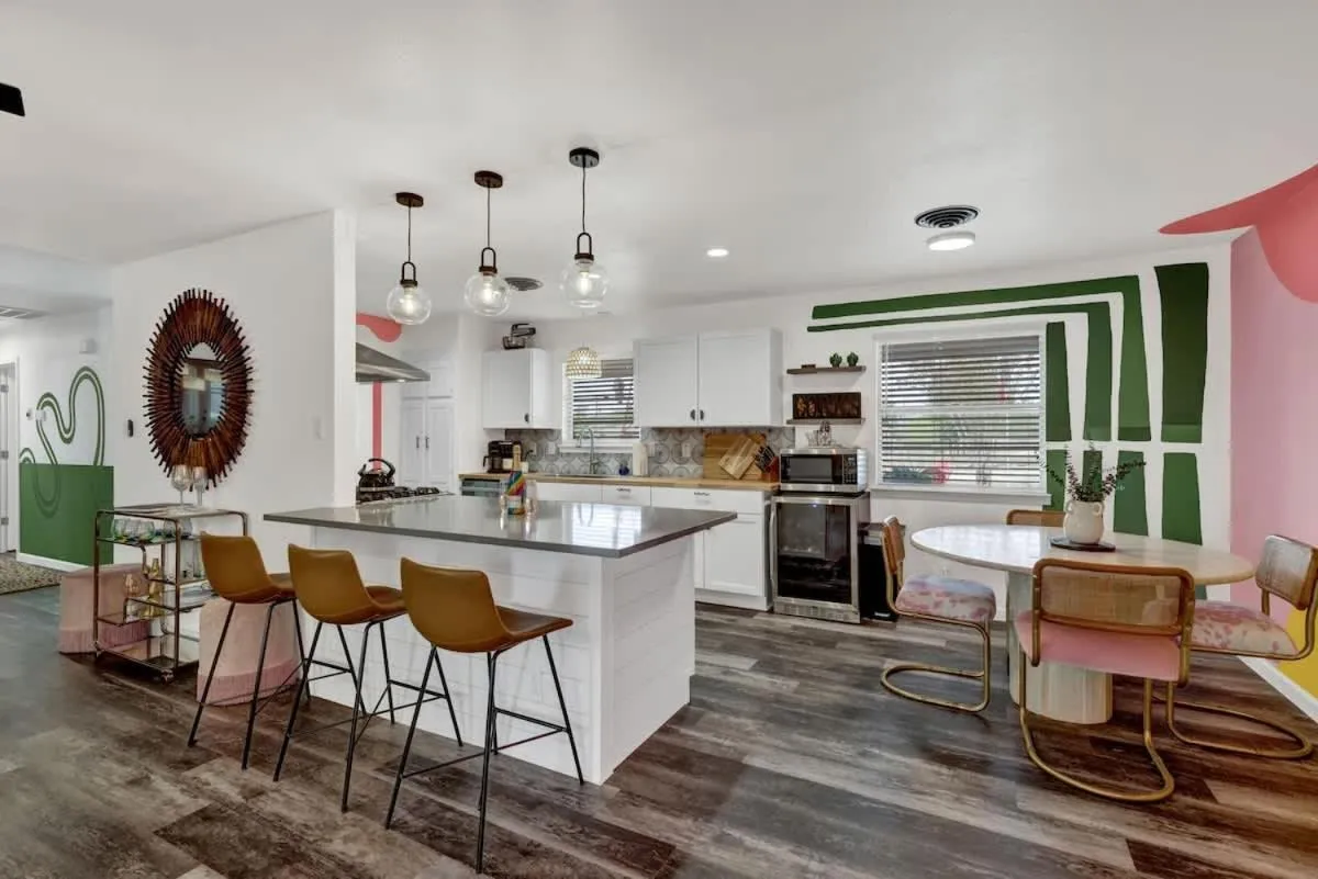 Dining area in Eclectic Fun Haus with Hot Tub - 3 Min Drive to Main