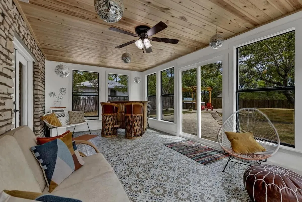 Living room in Eclectic Fun Haus with Hot Tub - 3 Min Drive to Main