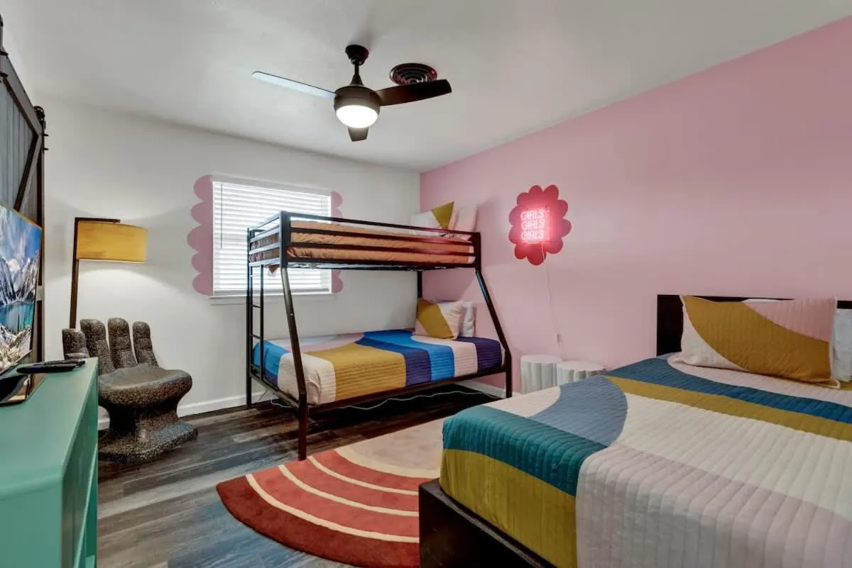 Bed in Eclectic Fun Haus with Hot Tub - 3 Min Drive to Main