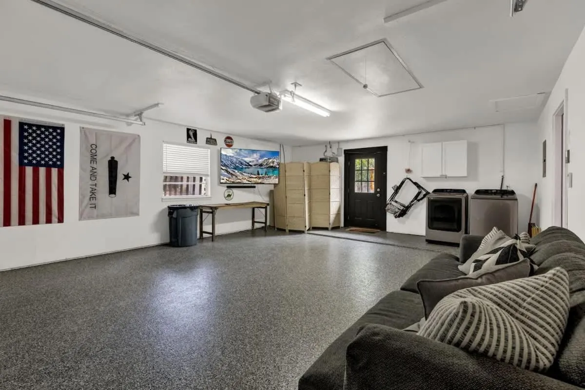 Living room in Eclectic Fun Haus with Hot Tub - 3 Min Drive to Main