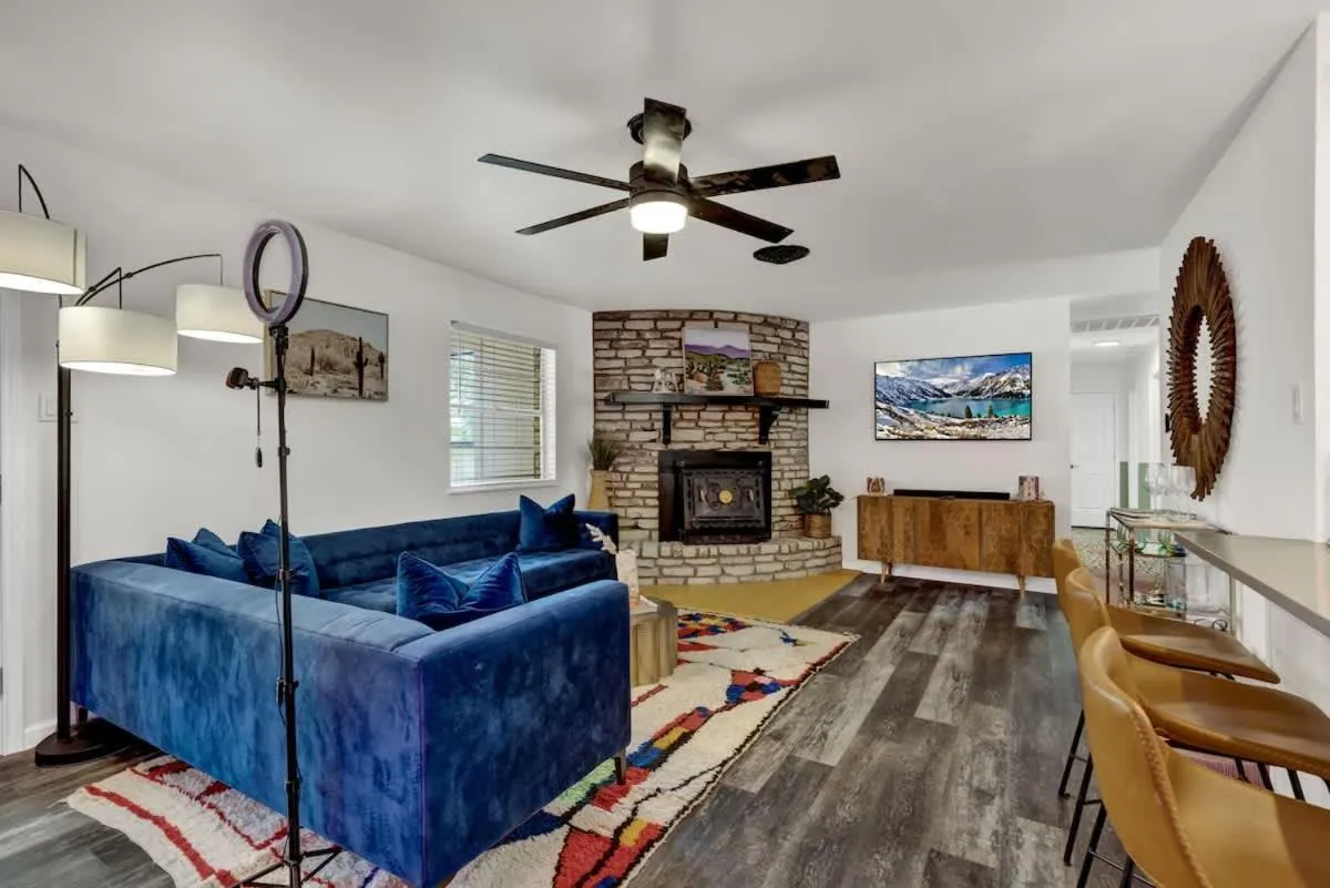 Living room in Eclectic Fun Haus with Hot Tub - 3 Min Drive to Main