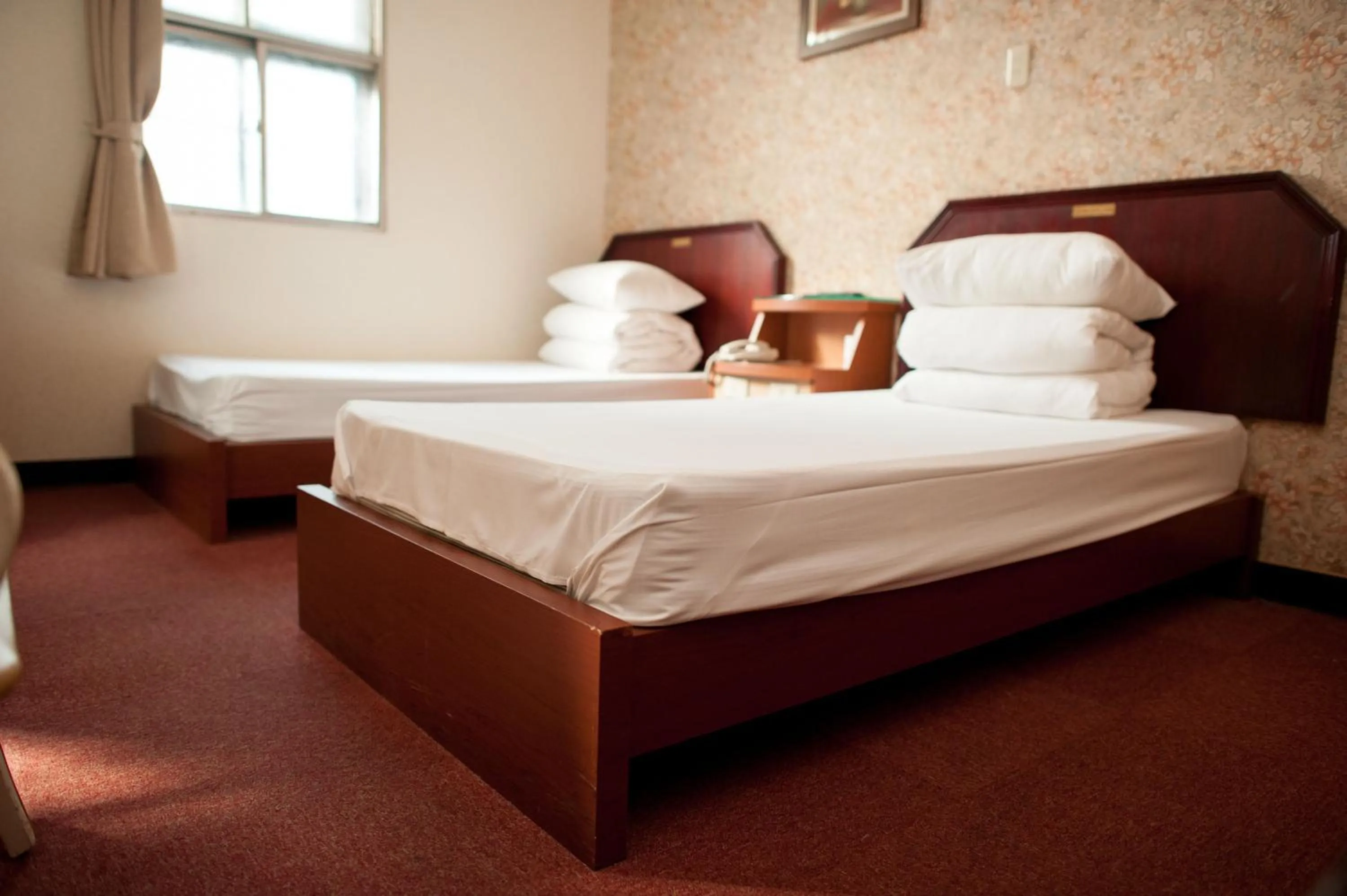 Bed in New May Flower Hotel