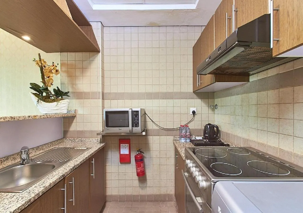 Kitchen or kitchenette in Mughal Suites