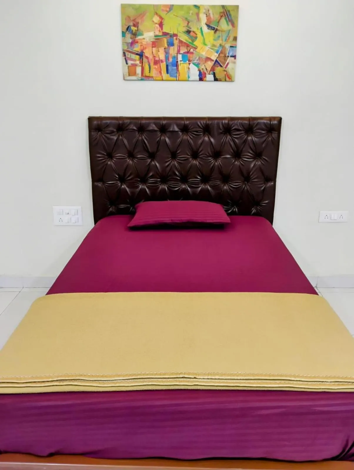 Bed in The Paradise Guest Inn