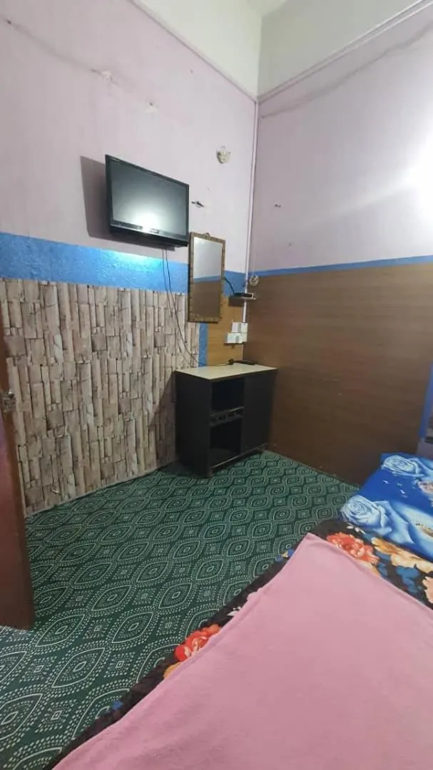 Bedroom in Hotel O Penginapan Almera