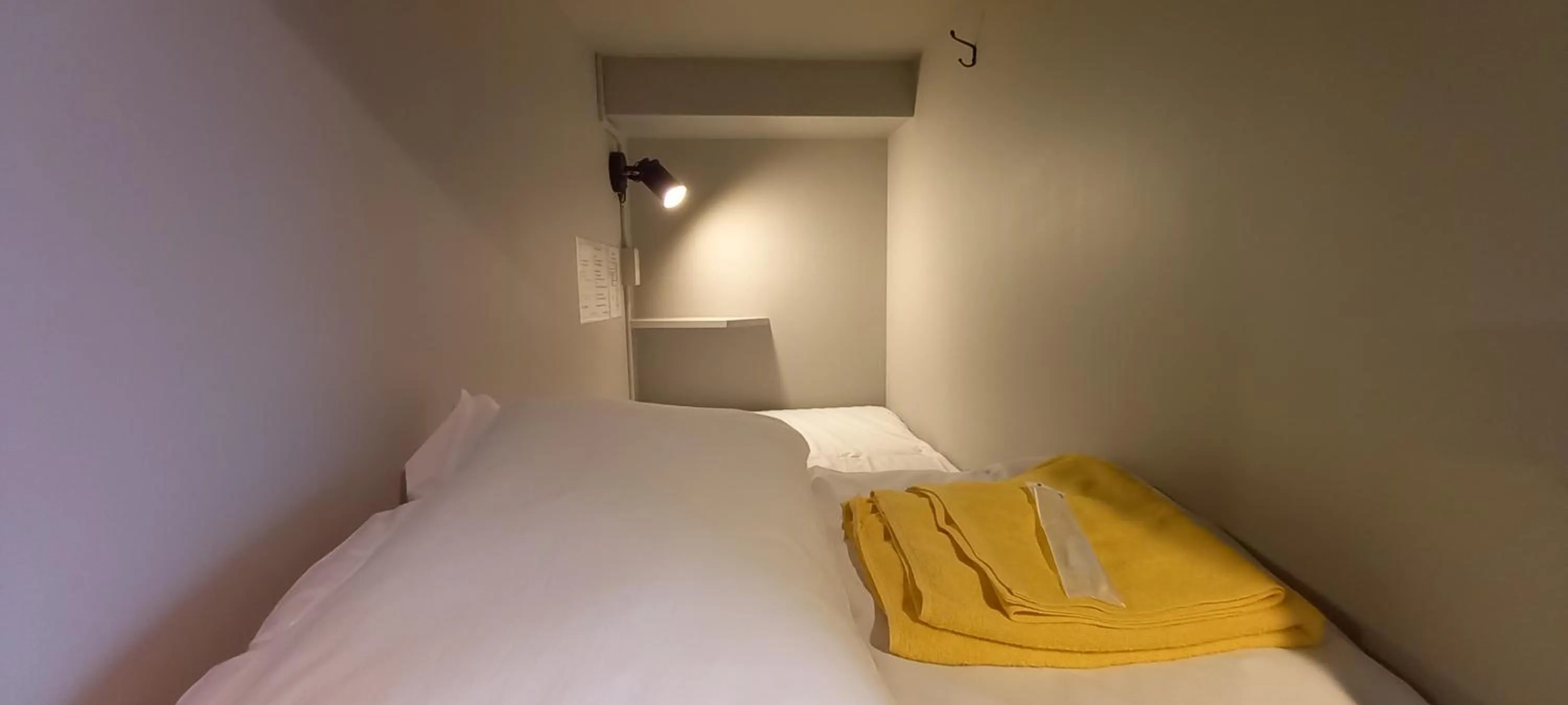 Bed in Wasabi Mita Hotel